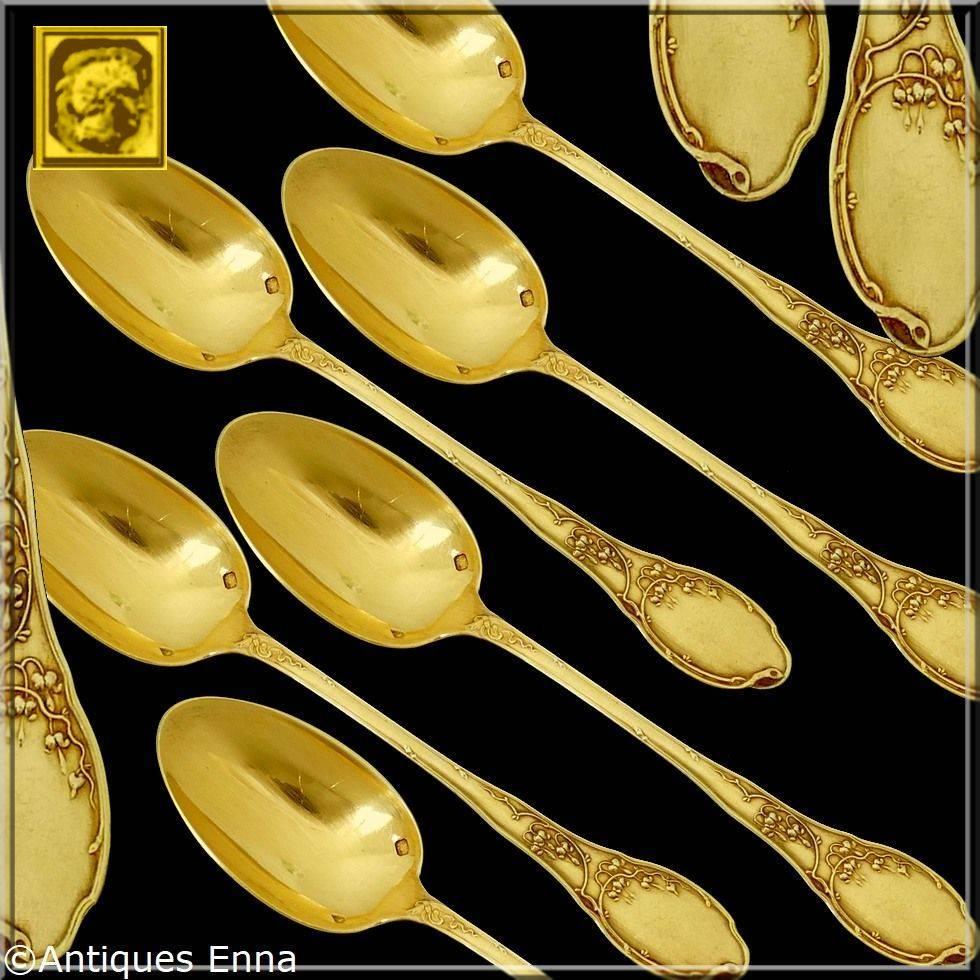 Fabulous antique 19th century French sterling silver tea coffee spoons set six-piece. Each ornately decorated in Art Nouveau styling with Thrush pattern. Finished with 18-karat gold. No monograms. This set is presented with a box.

In the