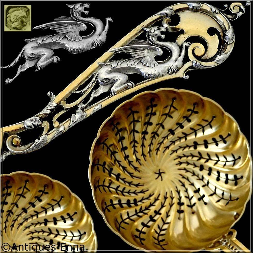 Masterpiece by the prestigious silversmith Soufflot with a circular pierced bowl, the silver-gilt inside the bowl, the pierced stem and handle with naturalistic decoration. 

A spoon of truly exceptional quality, for the richness of its decoration,