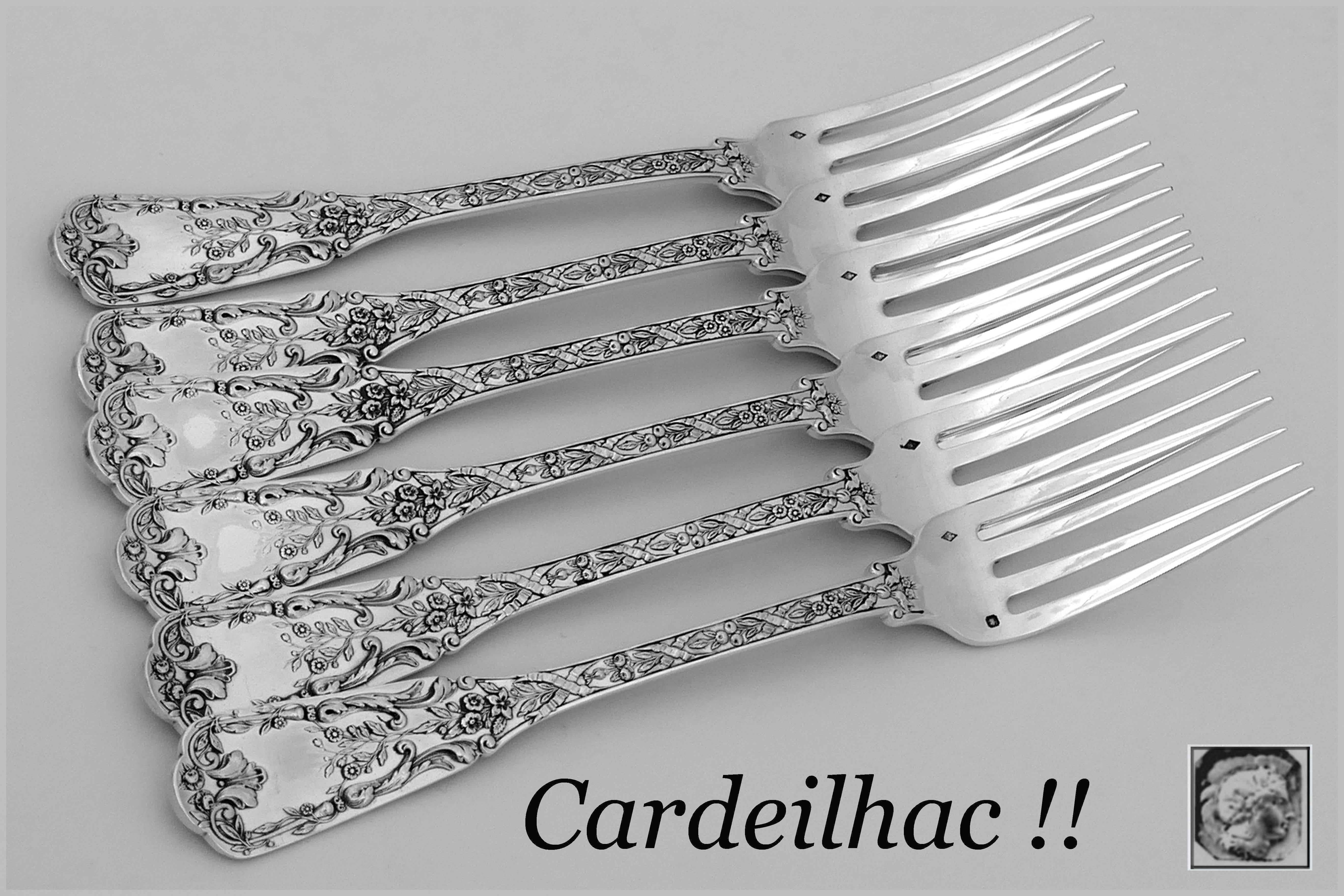 Fabulous French sterling silver dinner forks set six pieces. In the neoclassical pattern, with sumptuous decoration: Ribbons, garlands of flowers and foliage. 

Four sets available.

Of special note is the weight and heft of these pieces. 

To