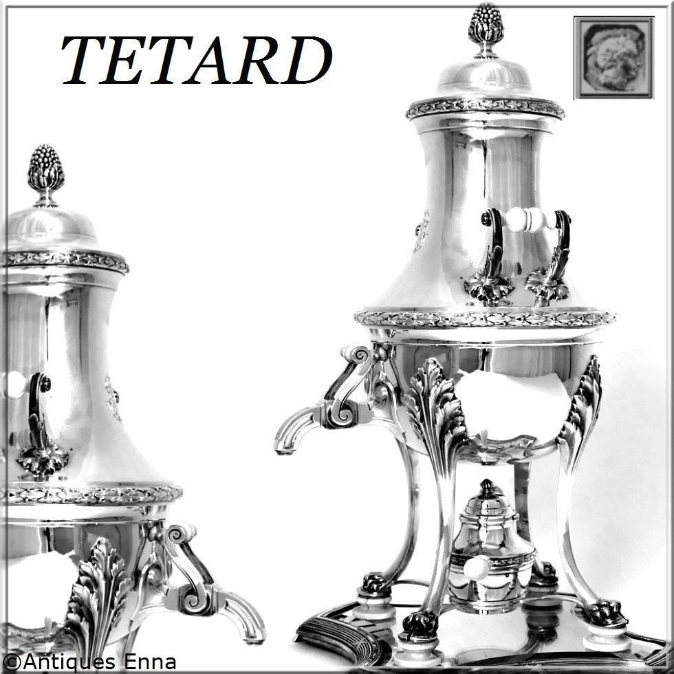 Tetard Majestic French sterling silver Louis XVI samovar / hot water urn.

A majestic French sterling silver Hot Water Urn / Samovar with elegant Louis XVI pattern. Decorated with a frieze of laurels, foliage, four feet in the shape of rams hoof