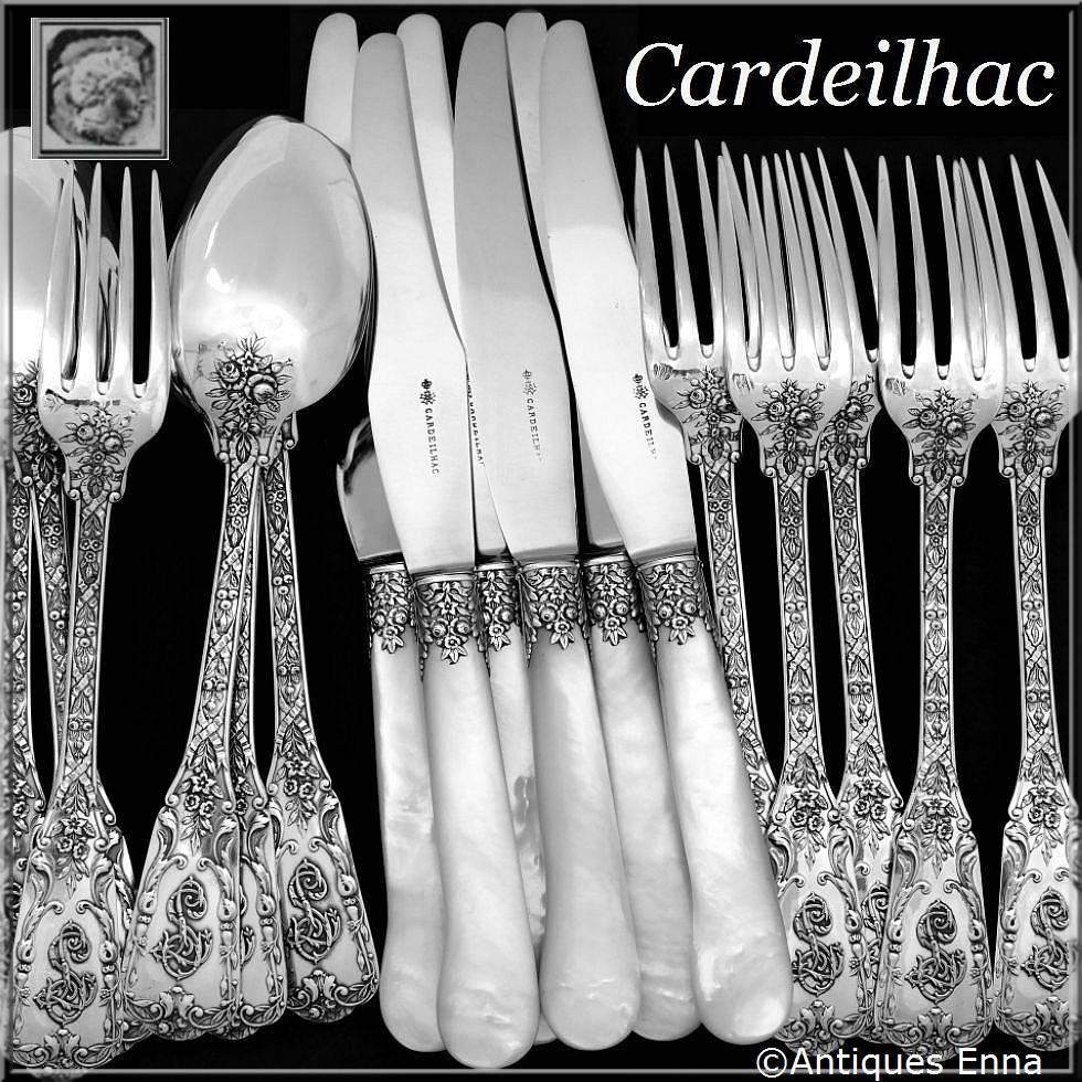 Fabulous French sterling silver dinner flatware set 18 pieces including six dinner spoons, six dinner forks and six matching dinner knife. In the neoclassical pattern, with sumptuous decoration: ribbons, garlands of flowers and foliage. Knives with
