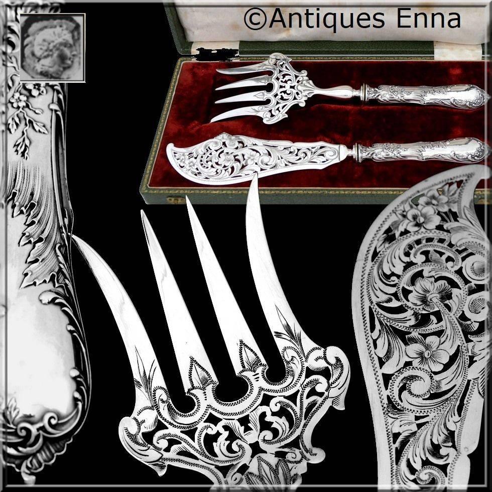 Ernie Gorgeous French sterling silver fish servers two pieces box Rococo.

Head of Minerve 1st titre on the handles for guarantee 950/1000 French sterling silver. The upper part of the fish servers are silver plated.

Two pieces of truly exceptional