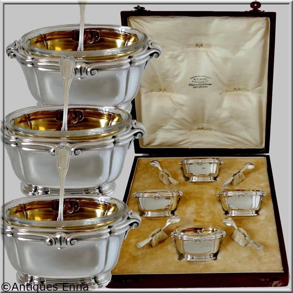 Head of Mercure first titre for 950/1000 French sterling silver guarantee. 

Fabulous French sterling silver salt cellars four-pieces. No monograms. This set is presented with its four original sterling silver spoons and in original