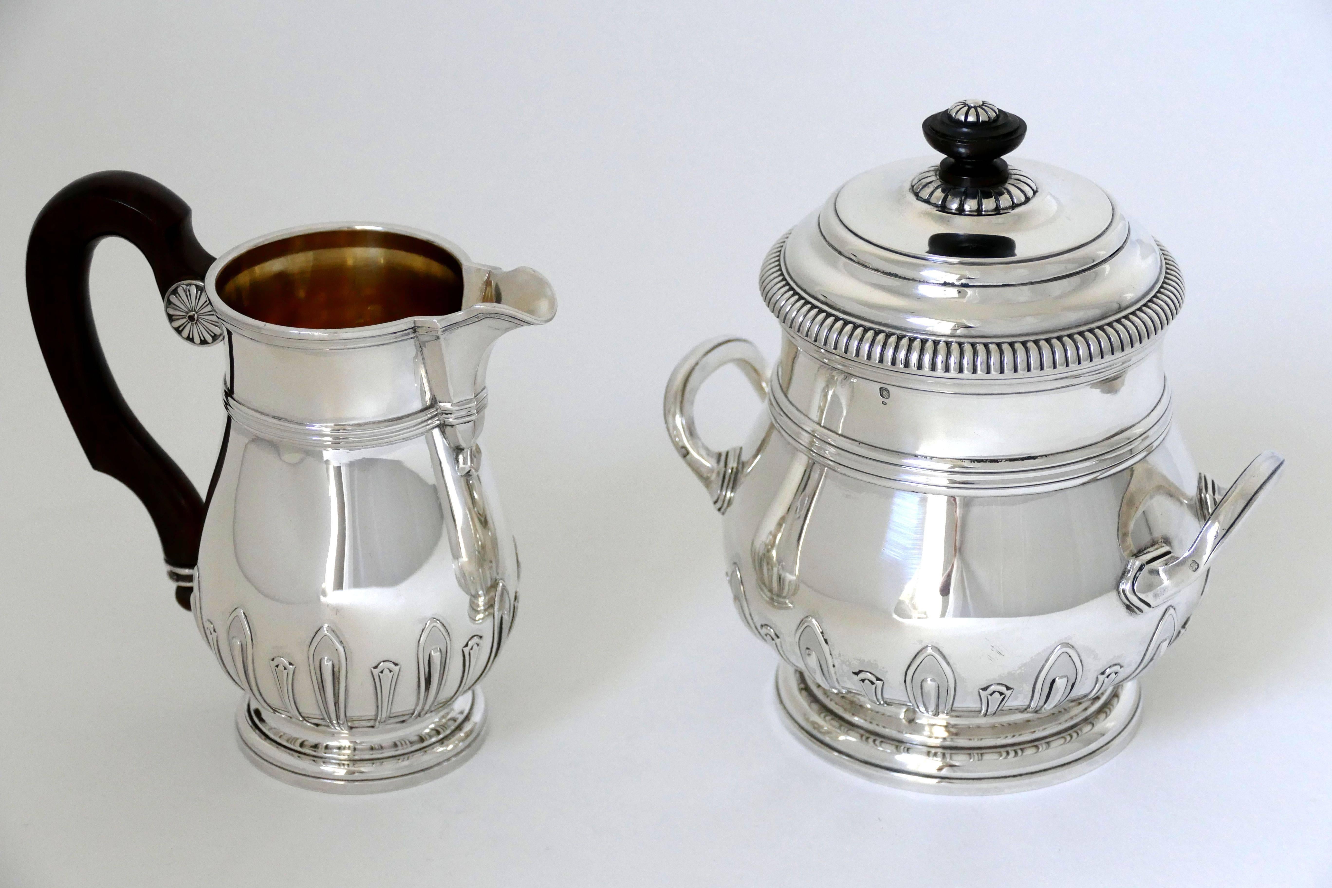 Early 20th Century Puiforcat Sterling Silver 18-Karat Gold Tea Pot, Coffee Pot, Sugar Pot, Creamer For Sale