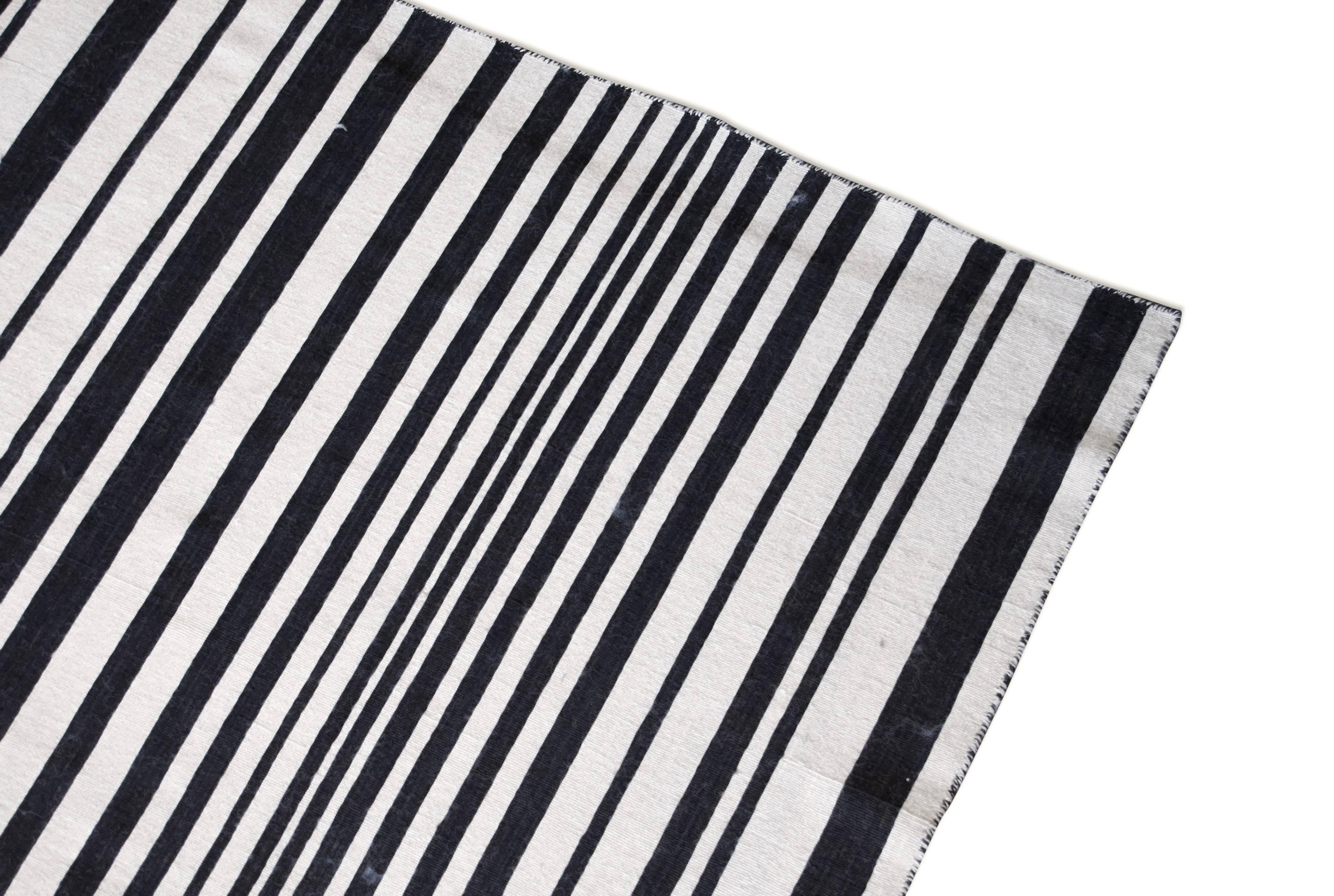 Bold black and white striped vintage modern Kilim. Flatware, Indian Kilim wool. Wear consistent with age.