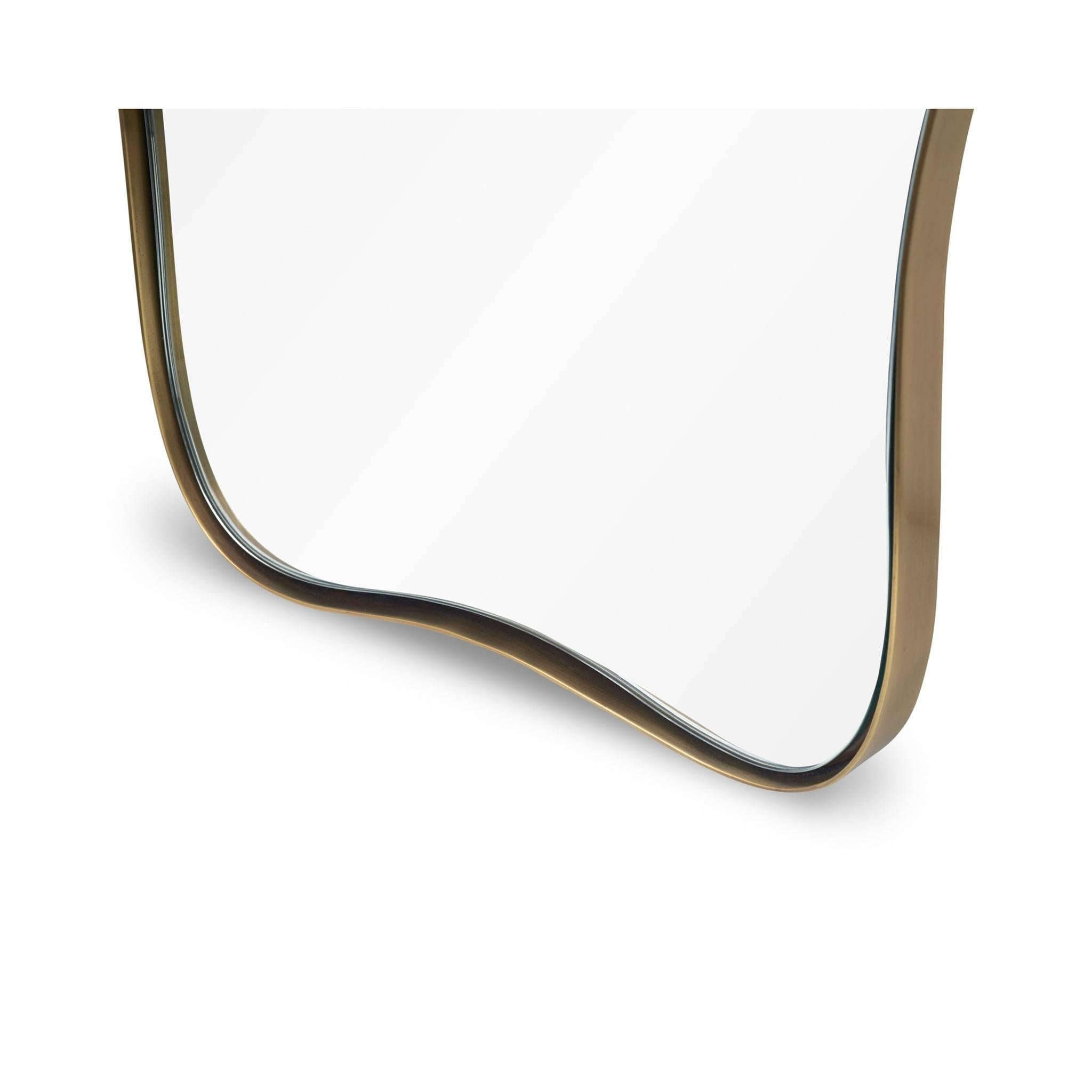 Italian modern-inspired mirror series available in an antique brass finish.