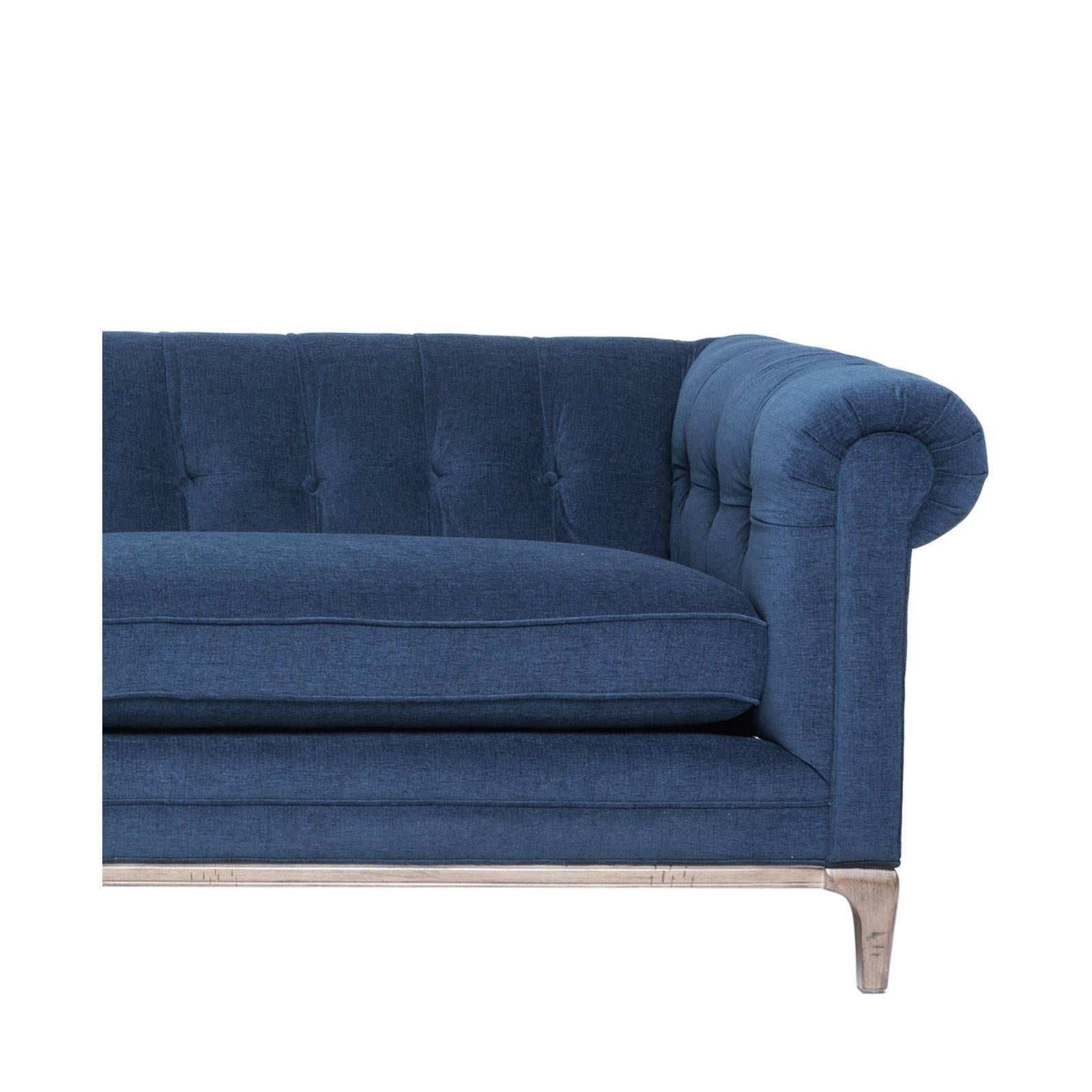 Simple elegance defines the Morgan sofa. This sofa is handmade of hardwoods, upholstered in supple navy chenille, and crafted with soft curves. 

