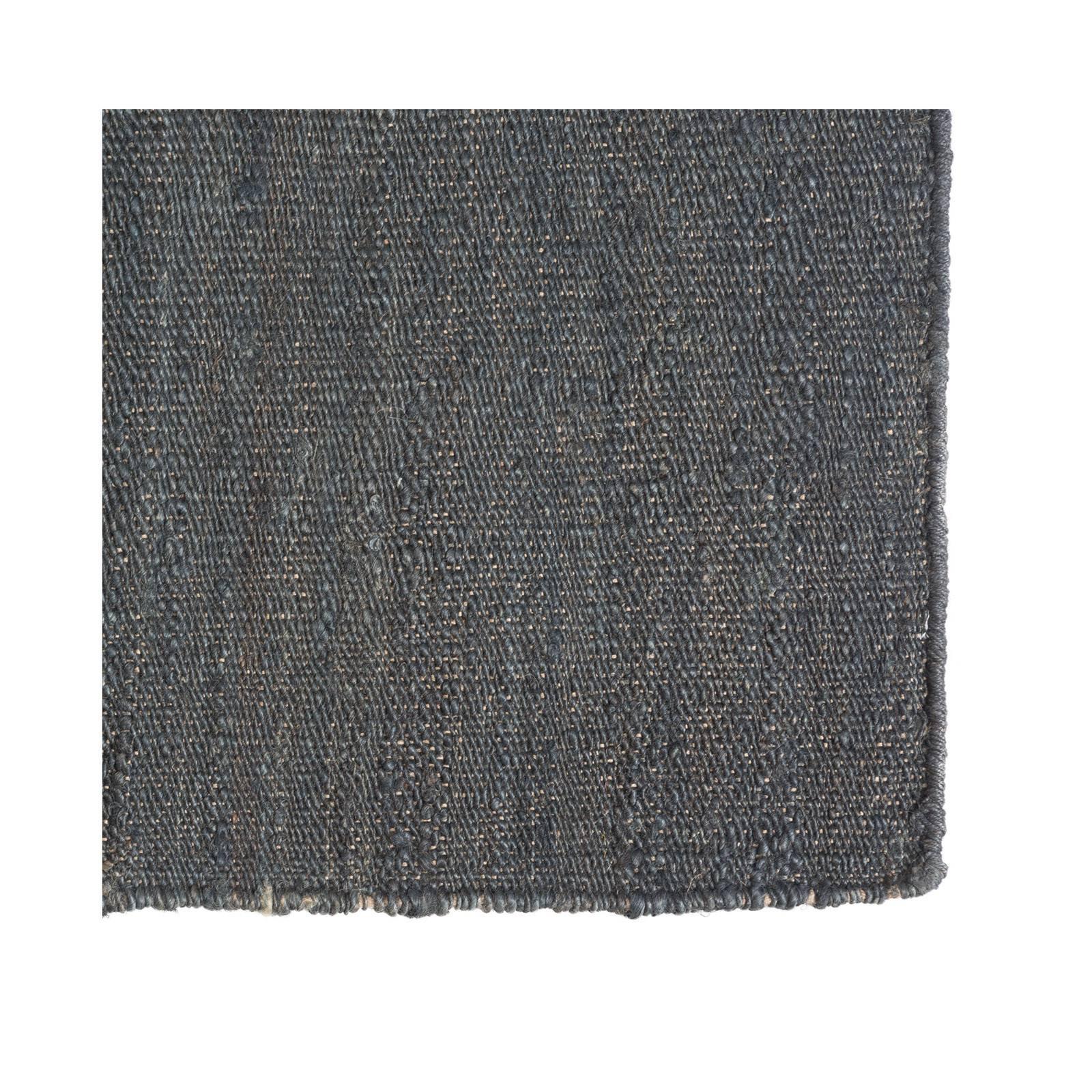 Hand-knotted jute rug. Handmade in India.