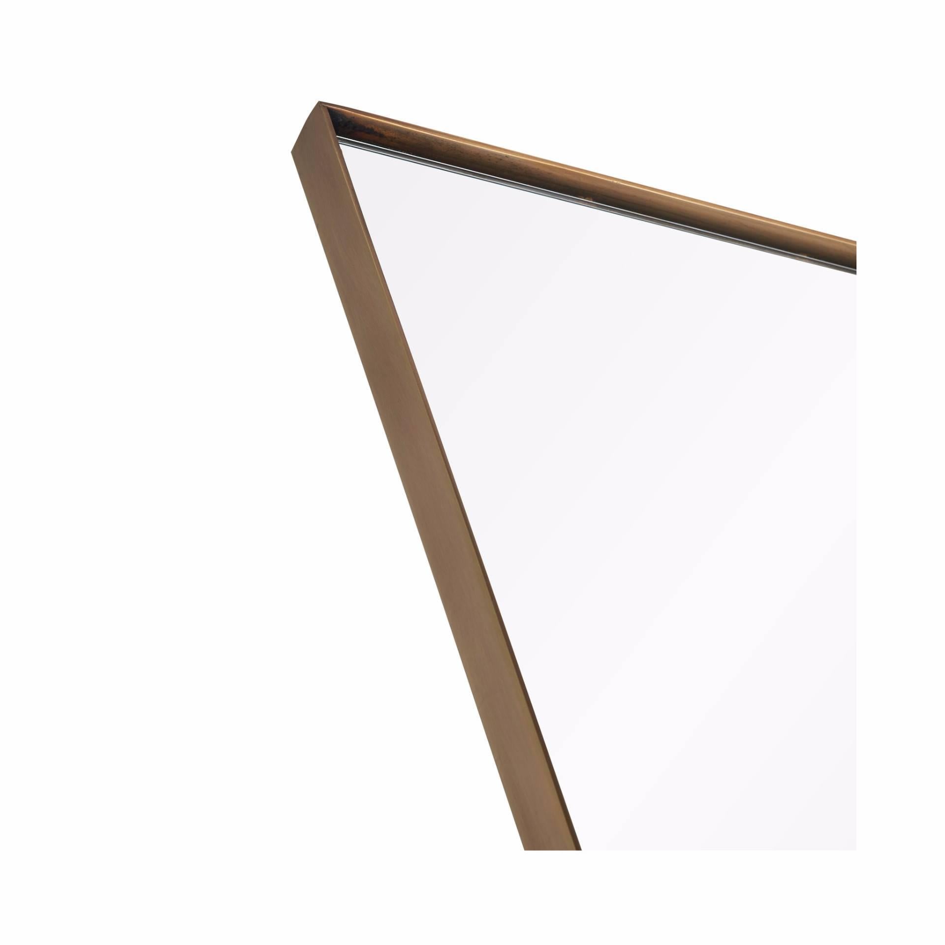 Italian modern inspired mirror series available in an antique brass finish.