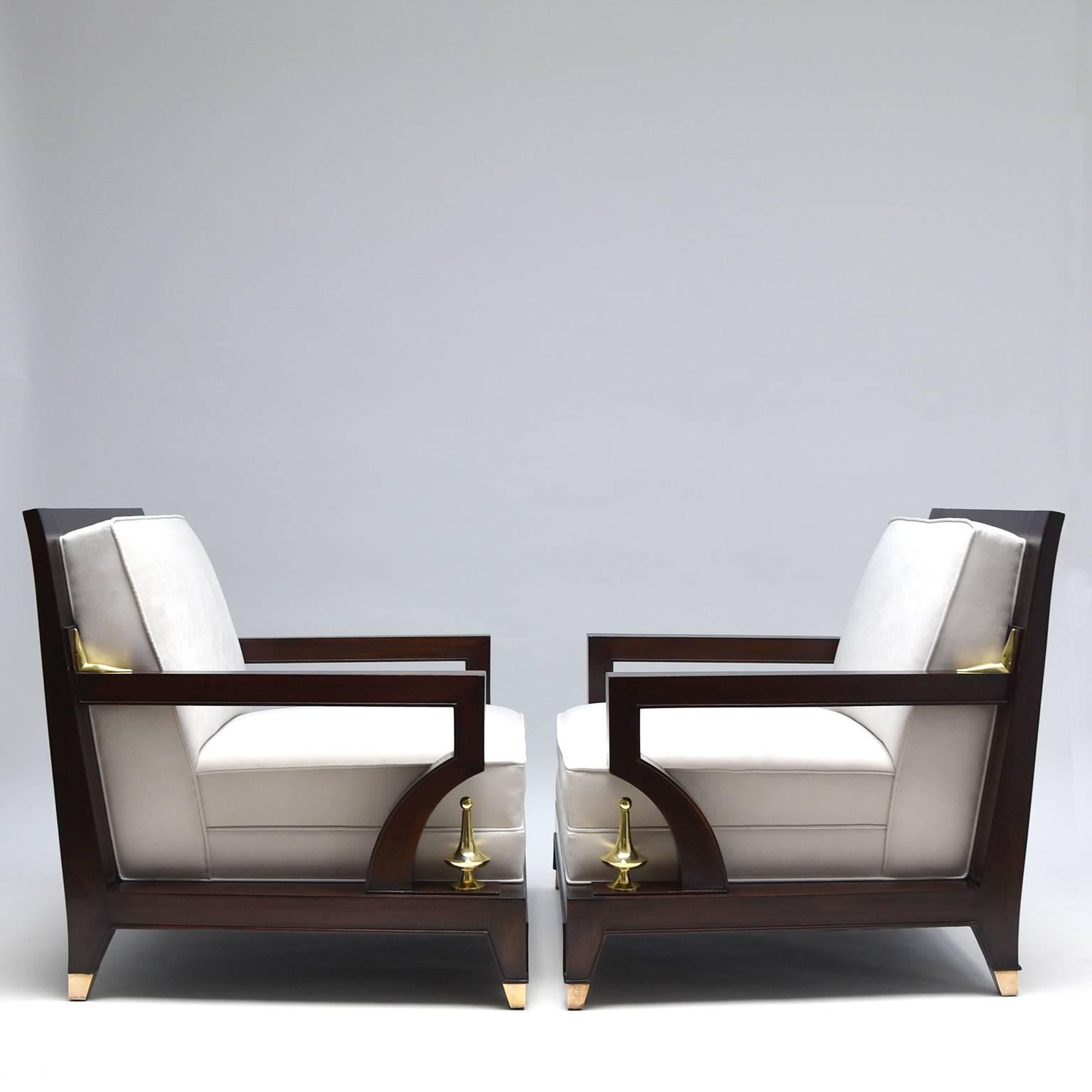 Great and extraordinary club chairs designed by Octavio Vidales. Manufactured in mahogany wood and upholstered in white.