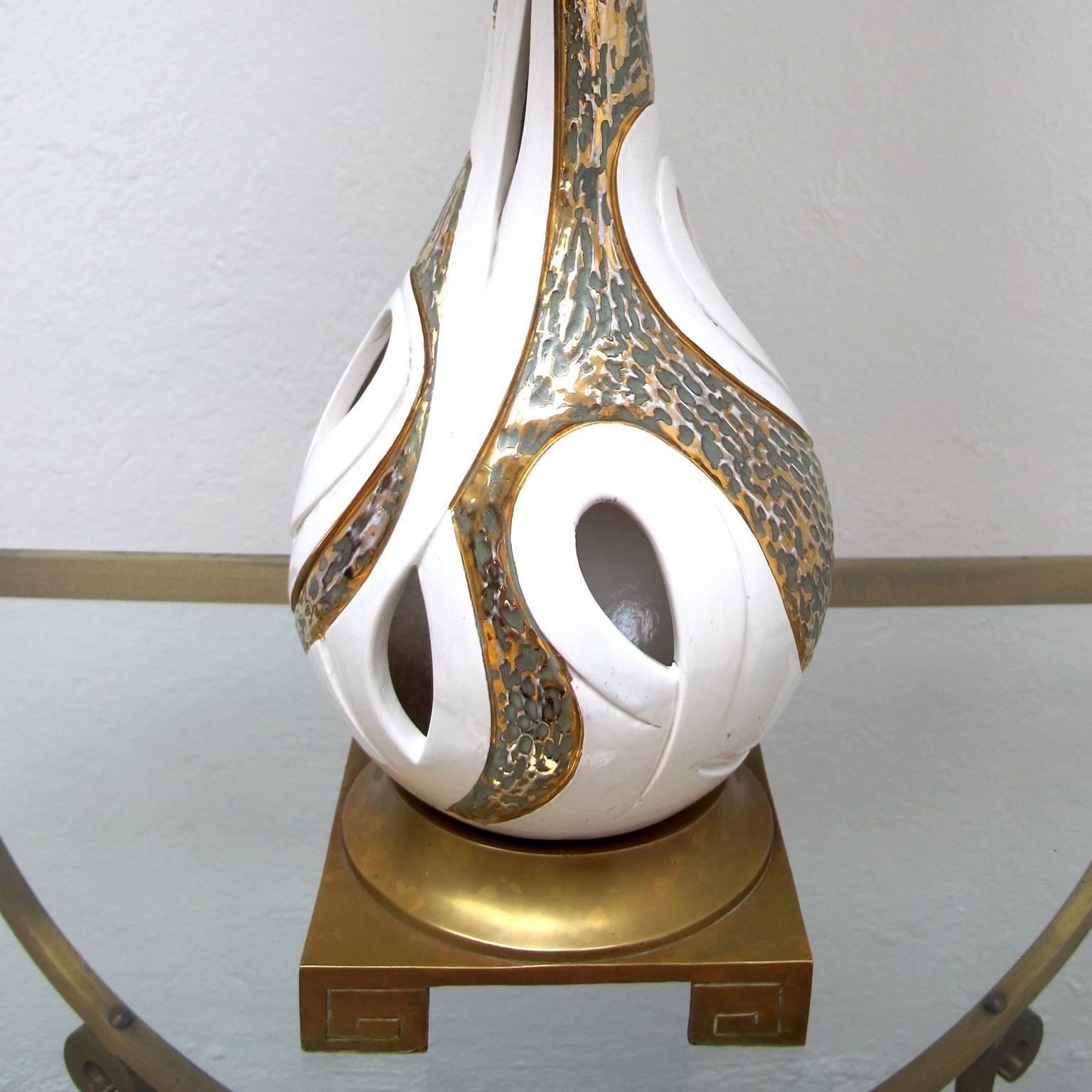 Mid-Century table lamp manufactured in ceramic with metal details and solid bronze base, signed by Blanco.