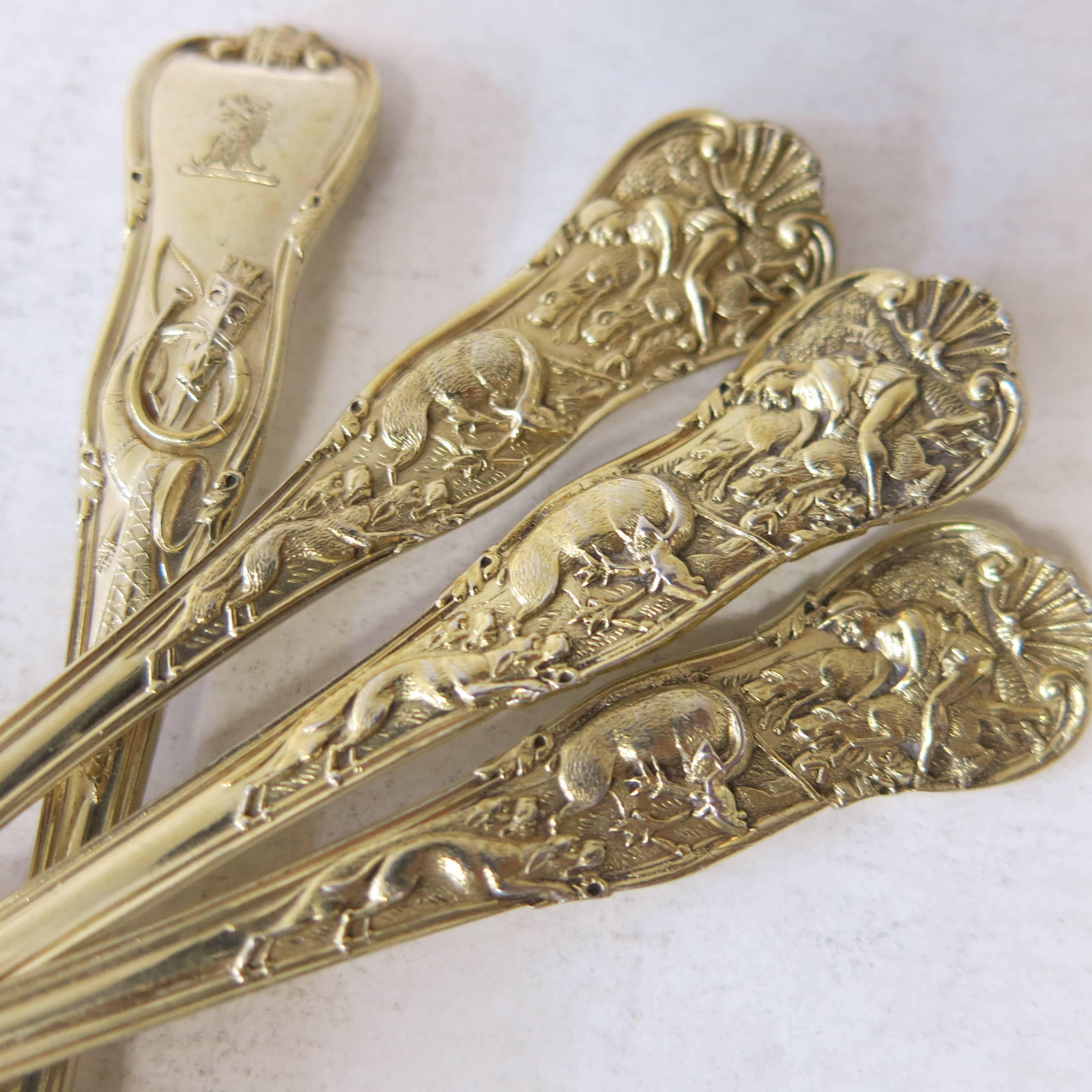 Stag Hunt pattern, six antique English, sterling silver Vermeil, ice cream spoons. Two are hallmarked 1887 by James Wakely & Frank Clarke Wheeler (Predecessor of Wakely & Wheeler). Four are hallmarked for 1876 by Henry John Lias & Henry John Lias