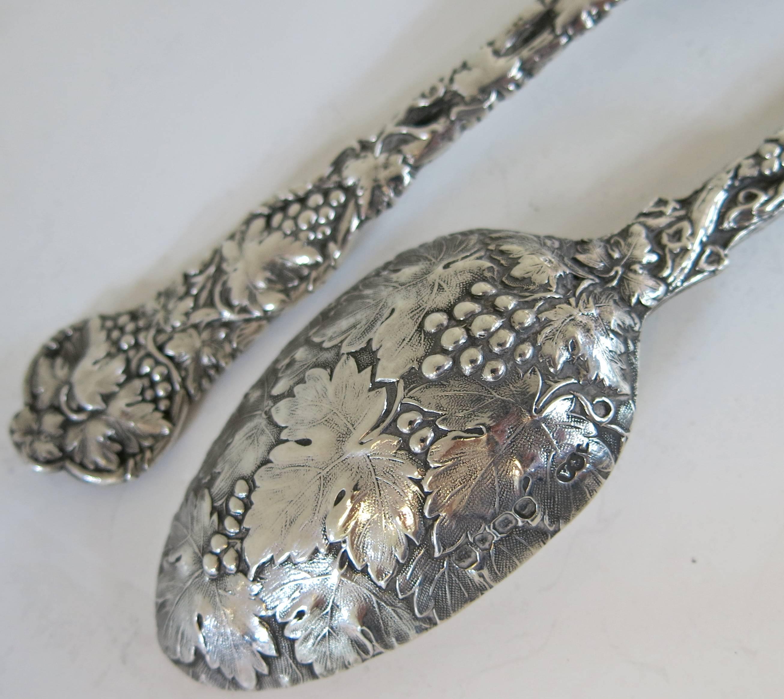 A rare pair of antique Victorian, sterling silver chased vine spoon and fork made by George Adams, London, 1848.
Measure: Spoon is 8 3/4
