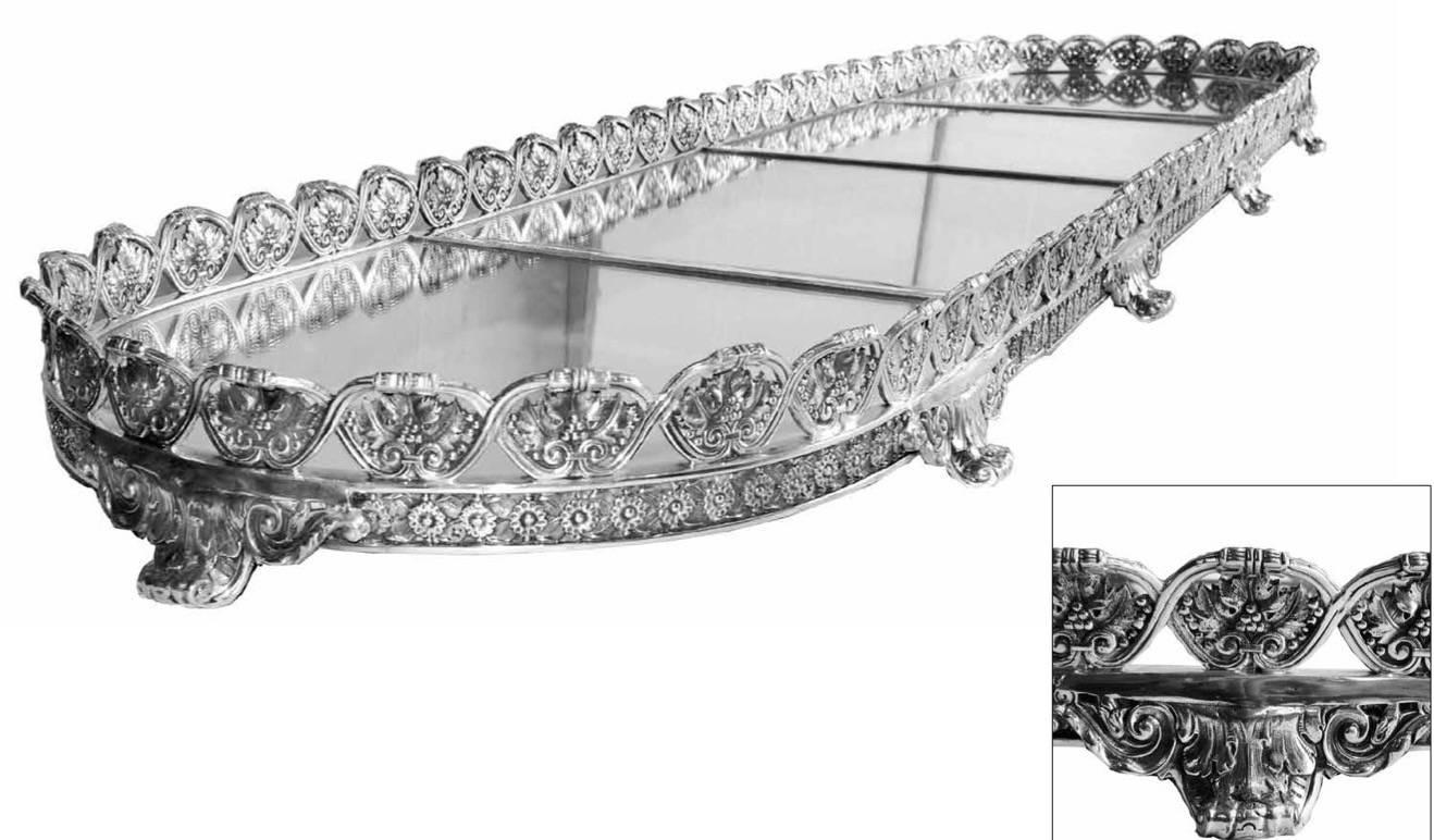 A highly decorative four-section silver plated plateau. Each section is approximate 16 1/4