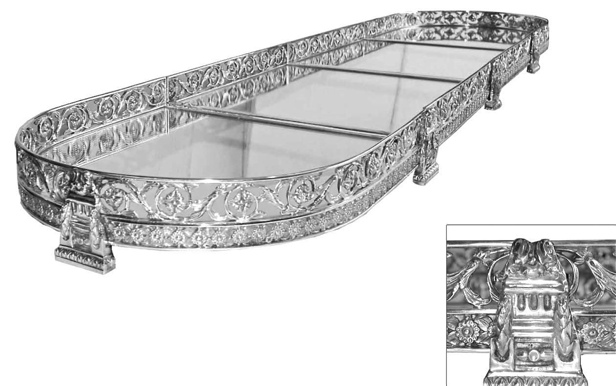 A highly decorative four section silver plated table plateau.
Each section approx. 16 1/4