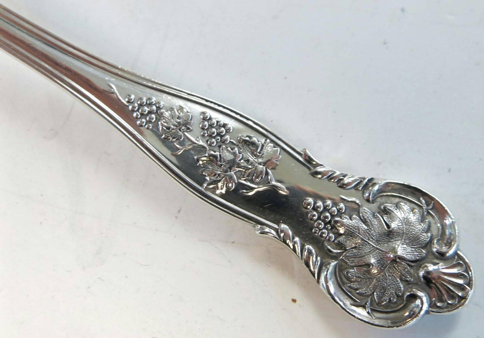 A rare and complete, hand-forged, sterling silver bright vine pattern flatware set made by CJ Vander. 
Set consists of the following:
12 table spoons - 8.25