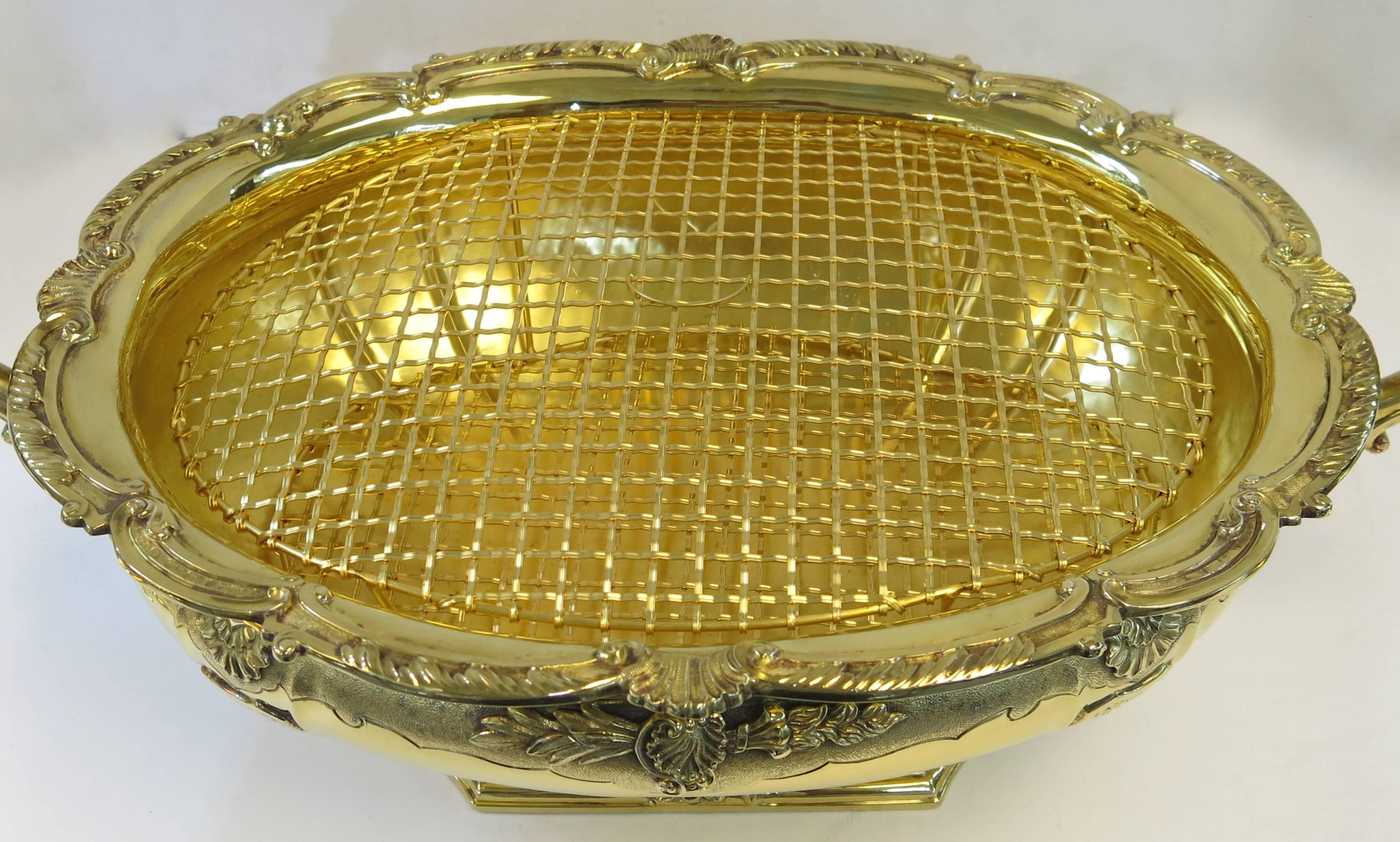 Custom made, sterling silver gilt, oval centrepiece or tureen, made with removable parts so that it can be used for a multitude of uses. Soup tureen, centrepiece, wine or champagne cooler, punch bowl, jardinière, fruit bowl etc. Handmade, in London,