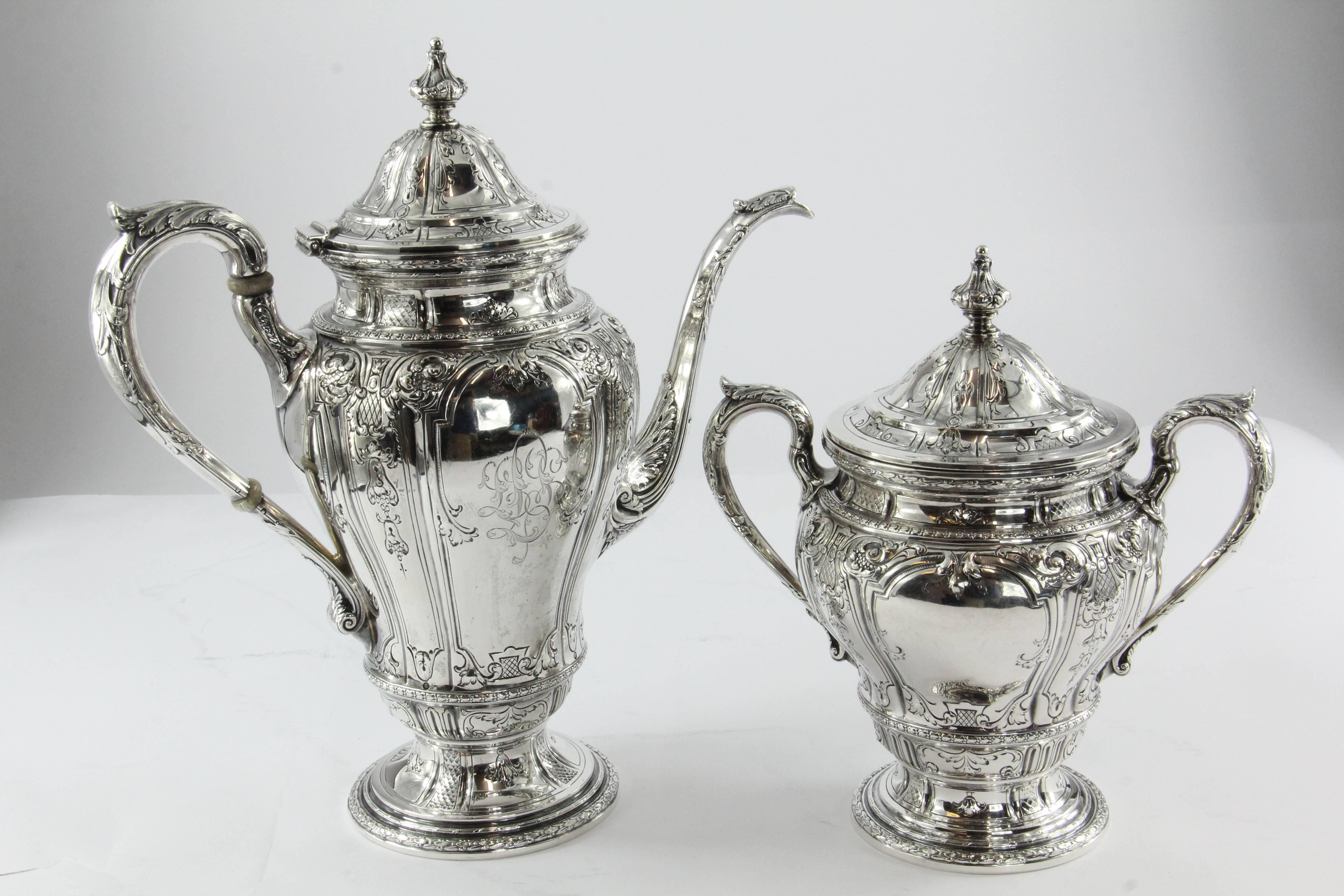 Antique Black Starr & Frost sterling silver complete seven-piece repousse tea set. The set is in great estate condition and ready to use. All the pieces have their original three letter fancy monogram on them. All of the pieces are hallmarked