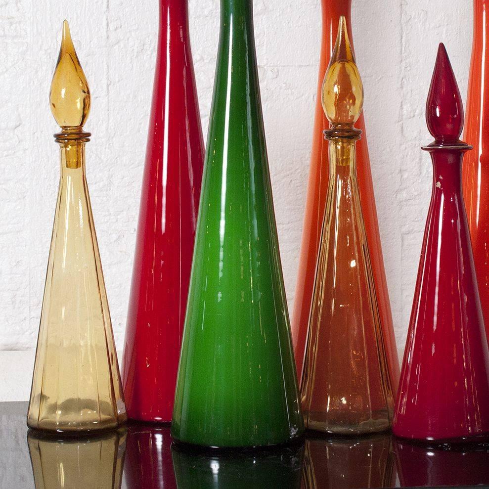1960s Italian. Mixed colors and sizes.
The sizes vary from 64 to 45 cm high.
The price is for the set of 13 decanters.