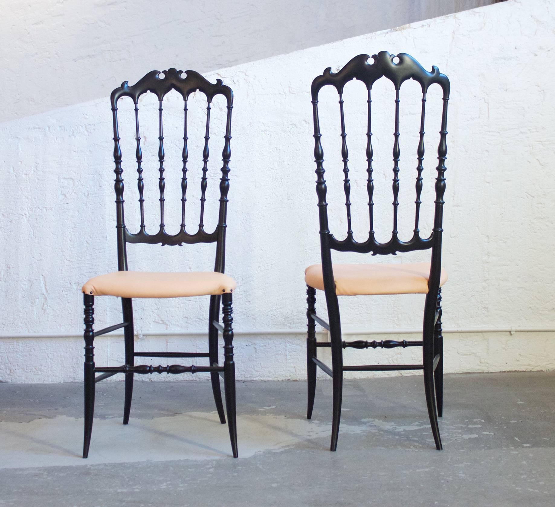 Chiavari chairs in black lacquered wood with seat in new upholstered leather from Tärnsjö. The Chiavari style was originally created by Giuseppe Gaetano.