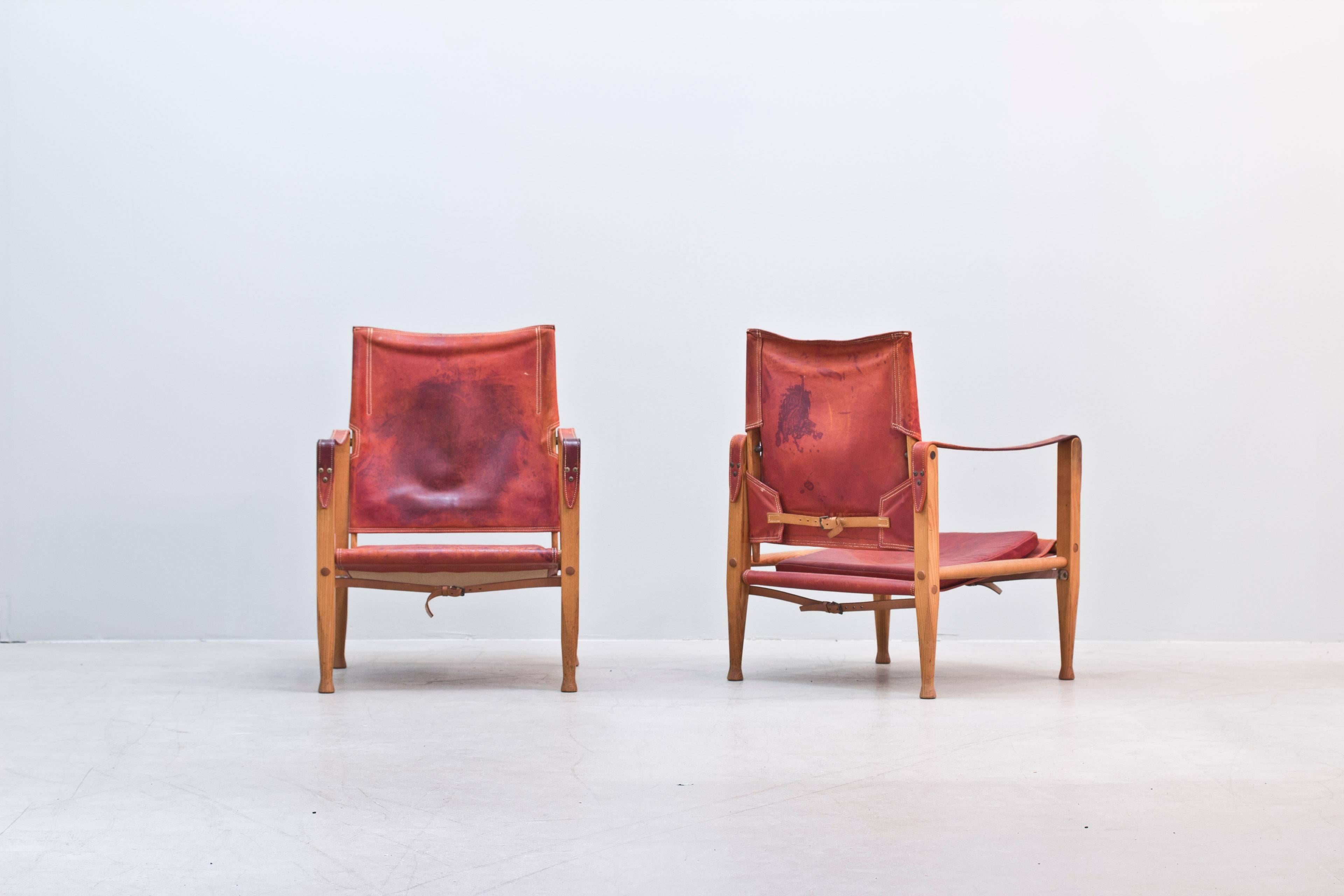 A rare pair of Safari Chairs in red leather with ashwood frame designed by
Kaare Klint (Danish, 1888–1954). Beautiful patina on the leather and the chairs are in great vintage condition.
  