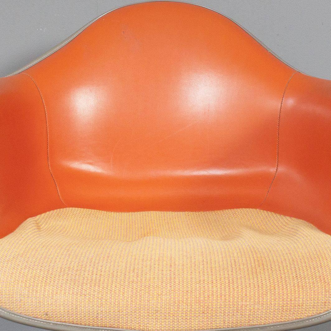 Eames for Herman Miller fiberglass office chair orange with swivel base DAT-1.