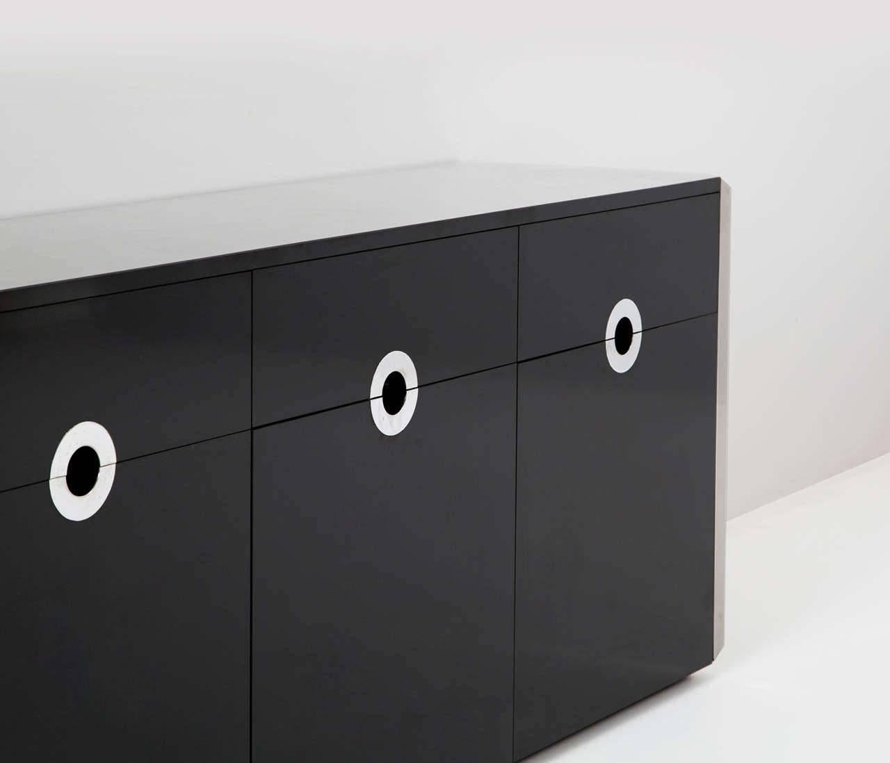 Three-door sideboards with drawers in black laminate wood with chrome detailed. In the style of Willy Rizzo, Italy, 1970s.

Measures: W 170 cm
H 75 cm
D 48 cm 

Price is for two.
  