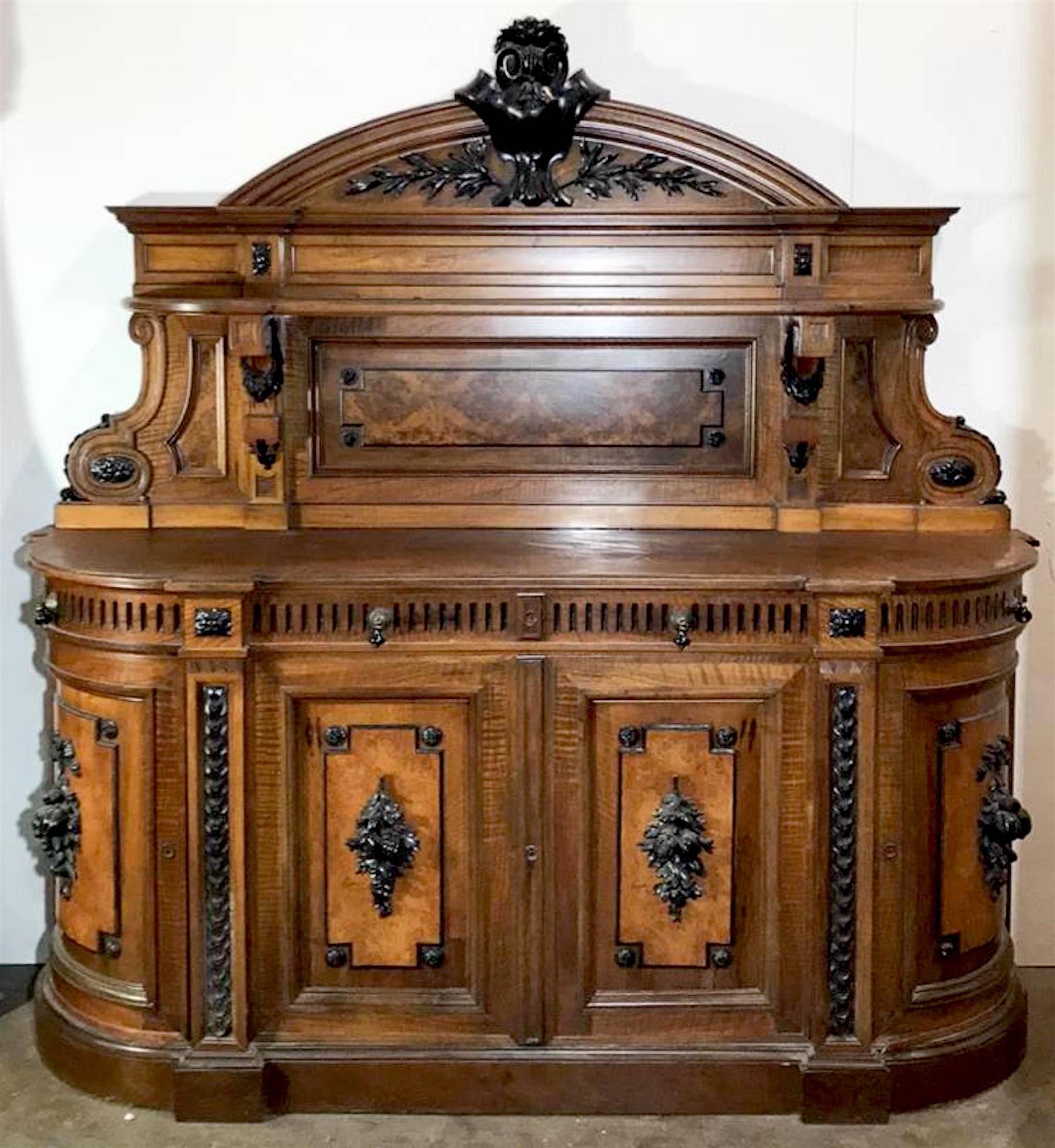 American High Victorian ebonized and burled hunt/sideboard in the style of Alexander Roux (1813-1886).