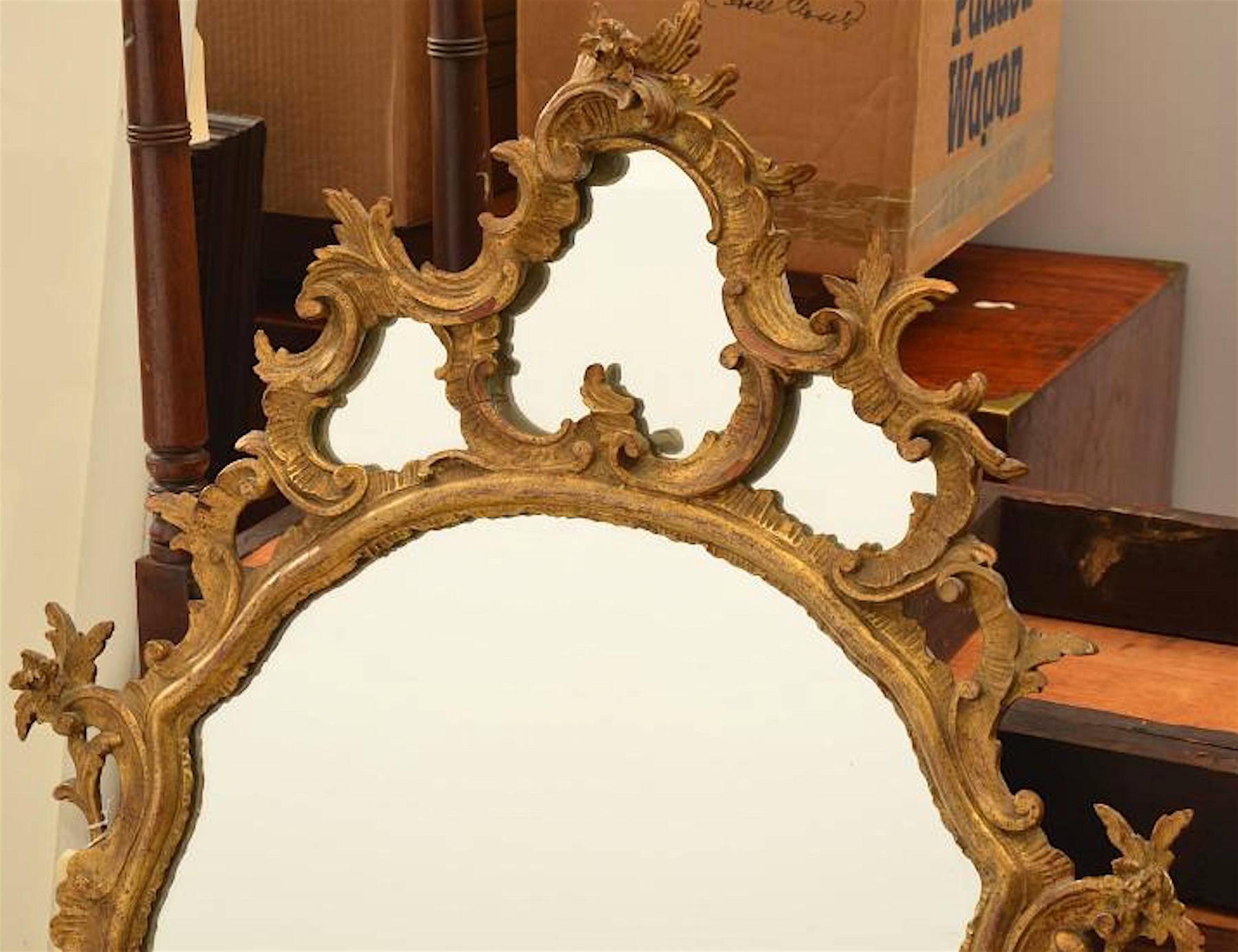 Italian 18th century style carved giltwood mirror, with three mirrored upper cartouches