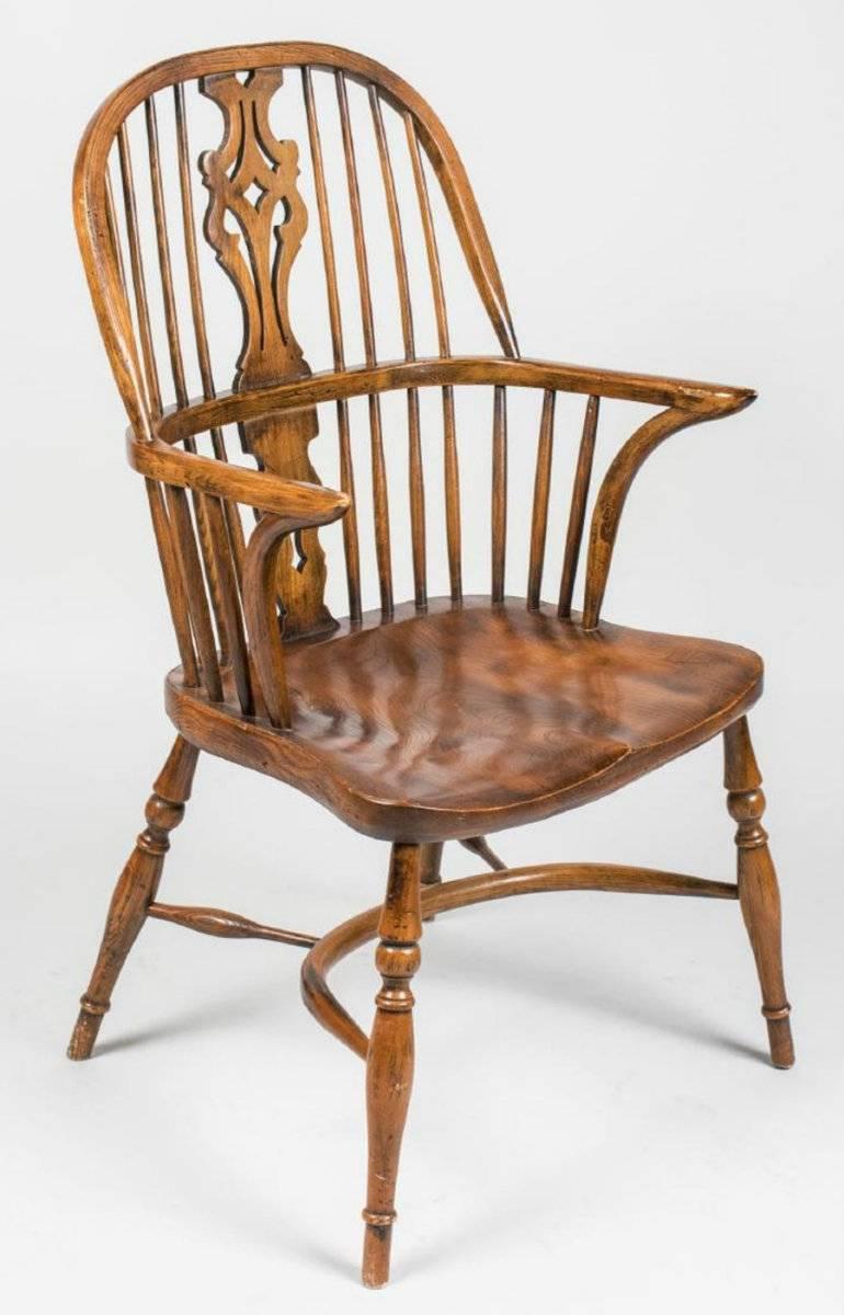 Set of six carved English walnut Windsor armchairs, each one with rounded carved spindle backrests. A beautiful sturdy set of very comfortable chairs, hard to find a set of six armchairs.