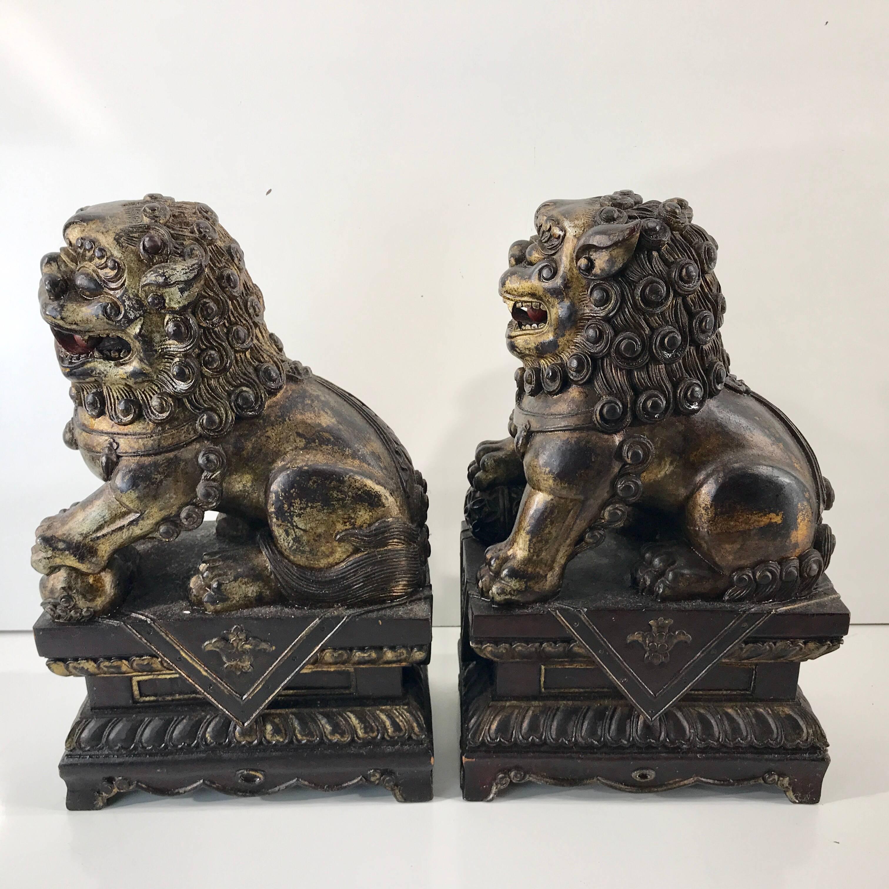 Pair of Chinese Carved Wood and Giltwood Foo Dogs 1