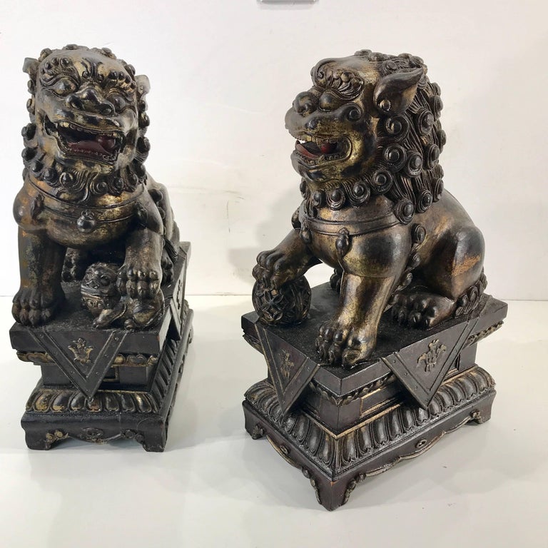 Pair of Chinese Carved Wood and Giltwood Foo Dogs at 1stDibs