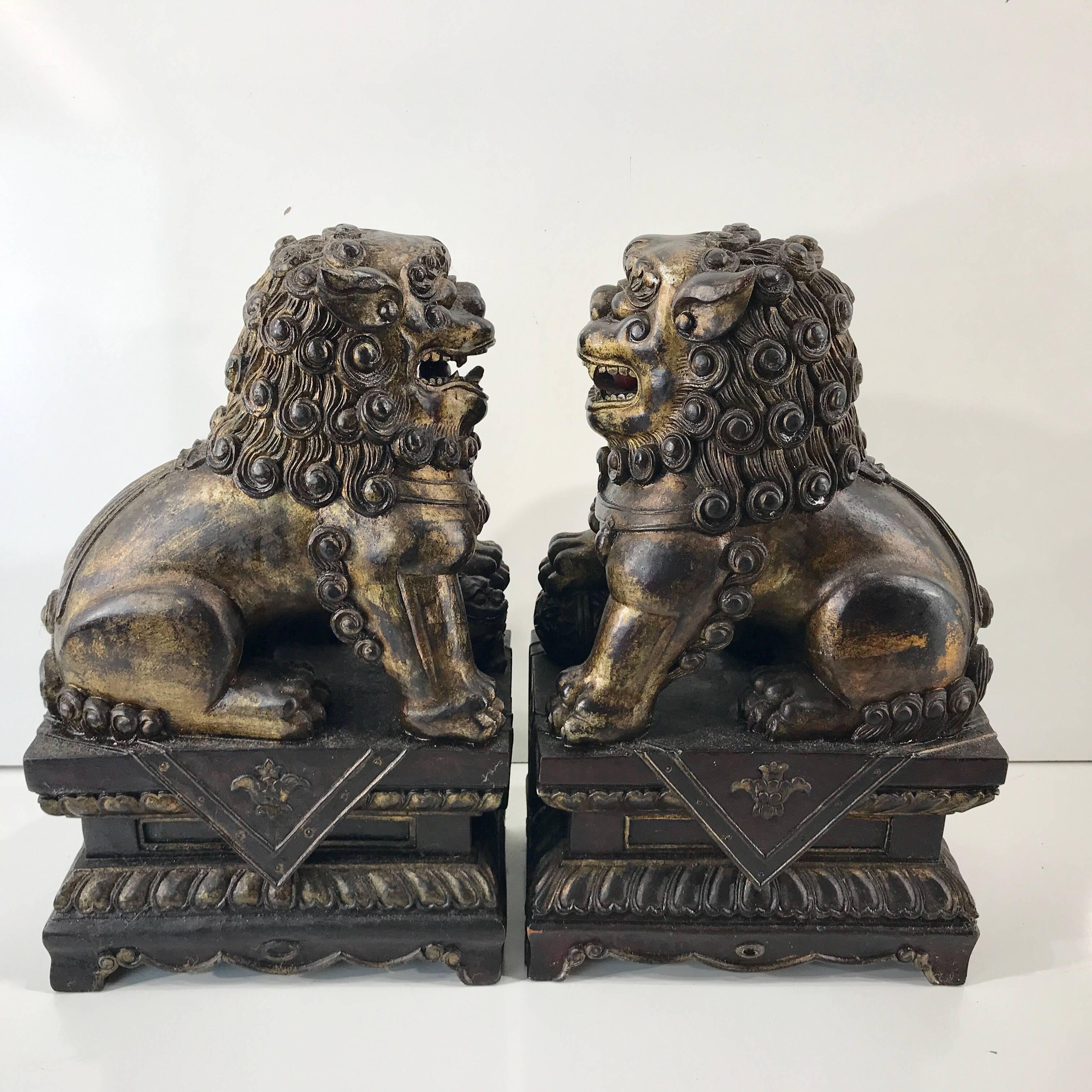 Pair of Chinese Carved Wood and Giltwood Foo Dogs In Good Condition In Atlanta, GA