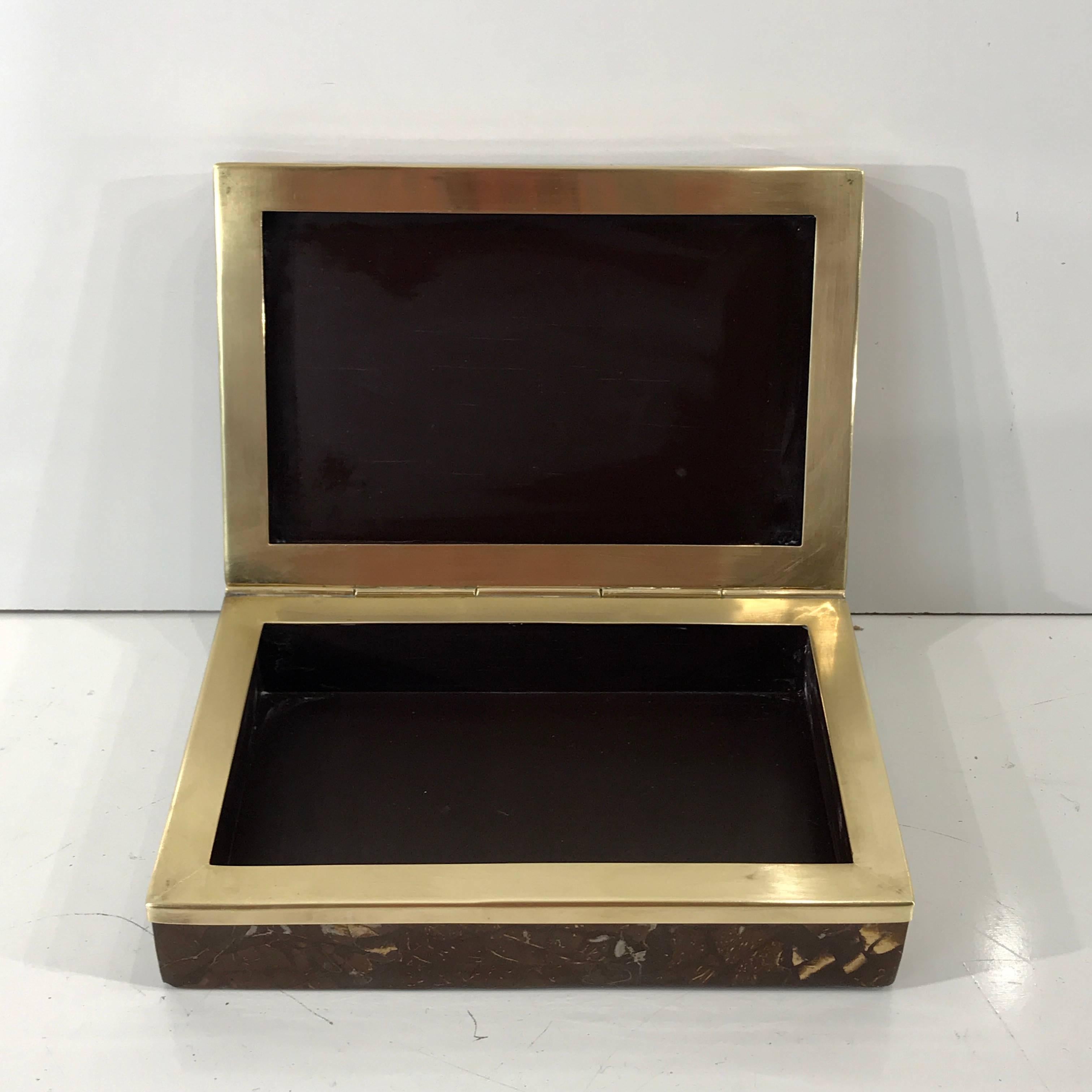 Exotic brass-mounted goatskin table box. The interior measures 7