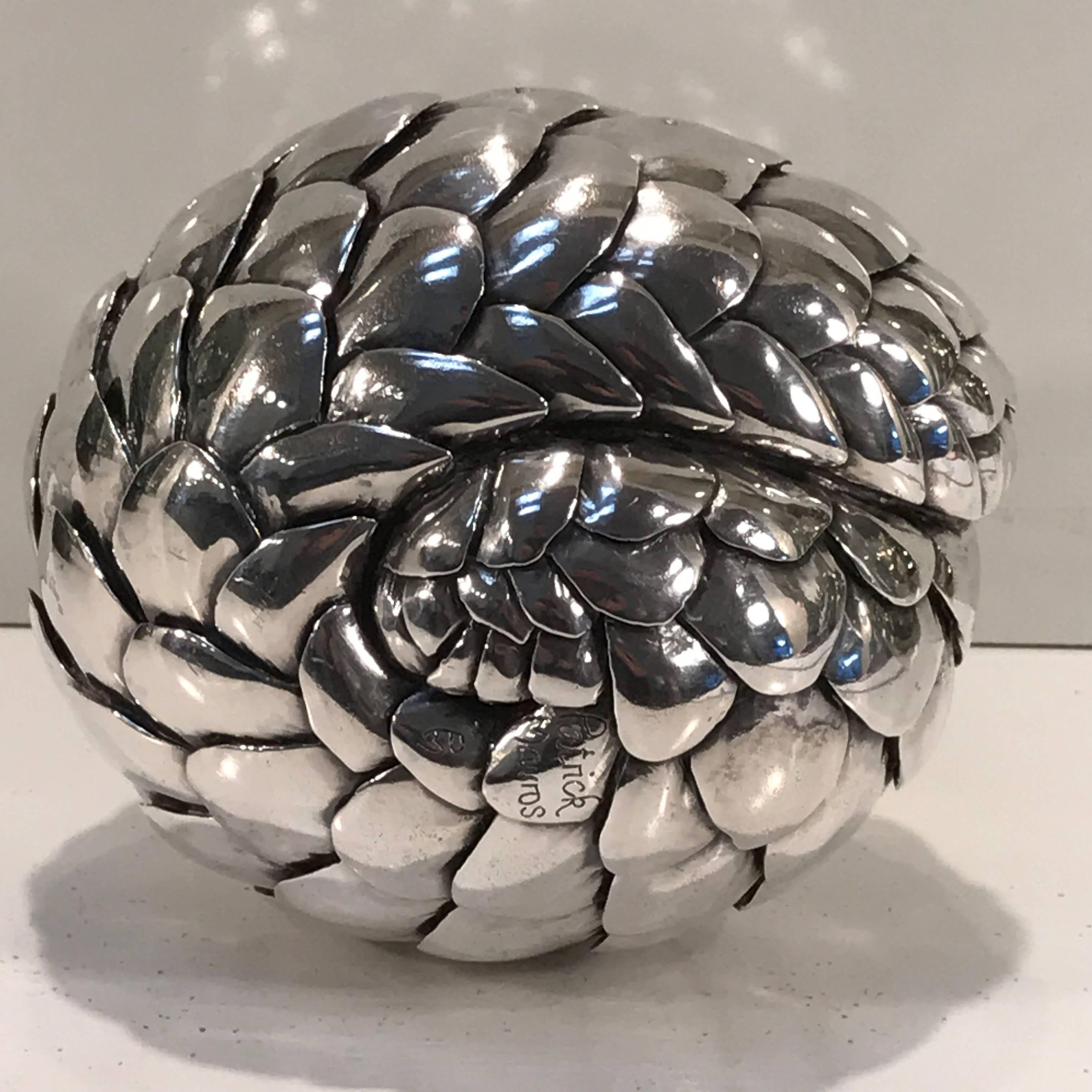 Patrick Marvos, monumental sterling sculpture of a Rolled Pangolin. Weighing over 40 troy ounces of Sterling Silver. Realistically cast whimsical freestanding sculpture/paperweight. Inscribed 