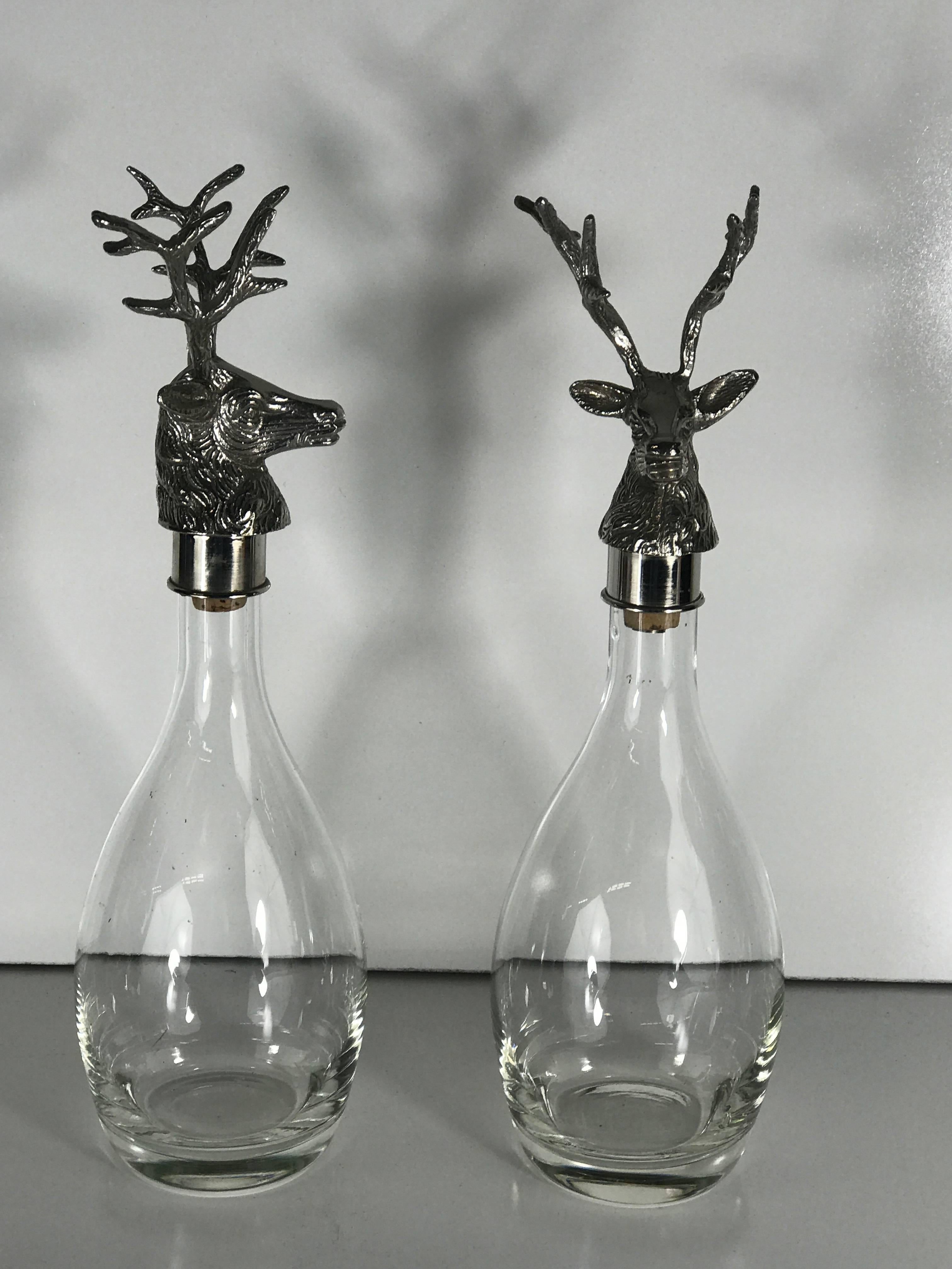 Pair of Arthur Court stag motif decanters, each one with a large and heavy cast stag head with a crystal decanter.
This item is at our Atlanta GA, Location, not Palm Beach.
