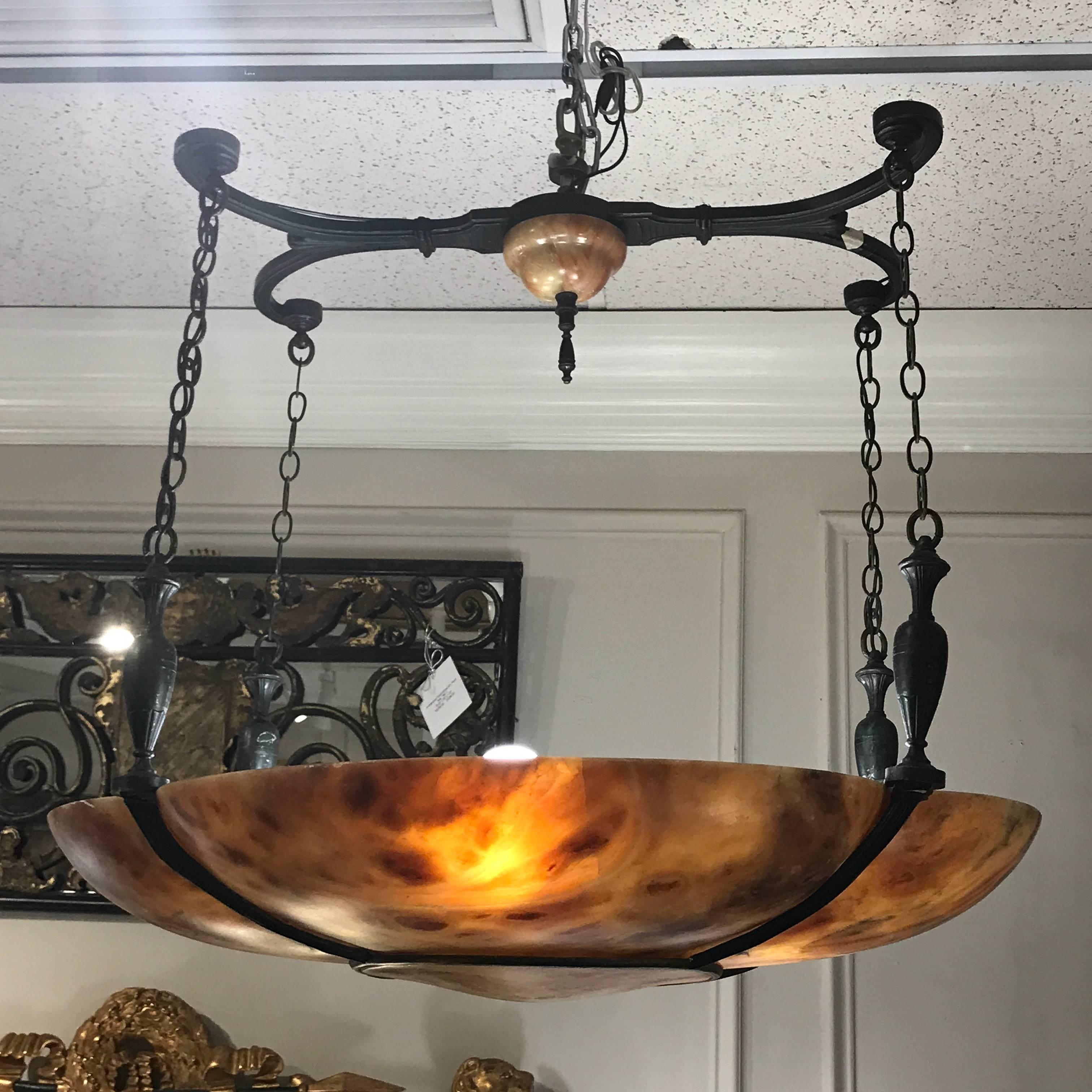 Beautiful neoclassical alabaster bronze-mounted chandelier, suspended by four chains with urn motif stretcher
