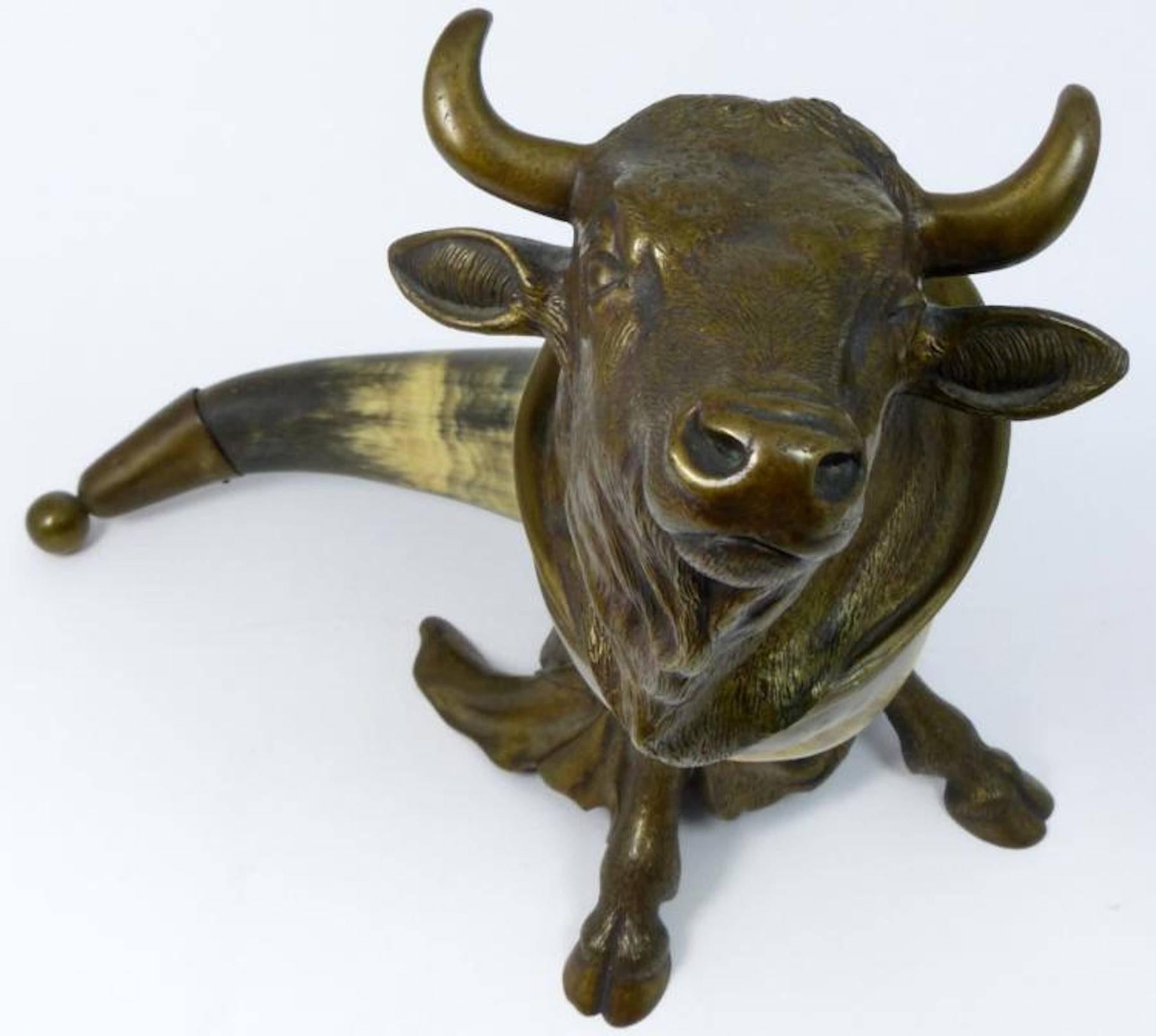 Viennese bronze table snuff mull or inkwell as a bull, realistically modeled and cast,  with a deep olive-brown patina, with natural matte polished bulls horn. An imaginative 19th-century bronze animalier sculpture/desk accessory for someone who has