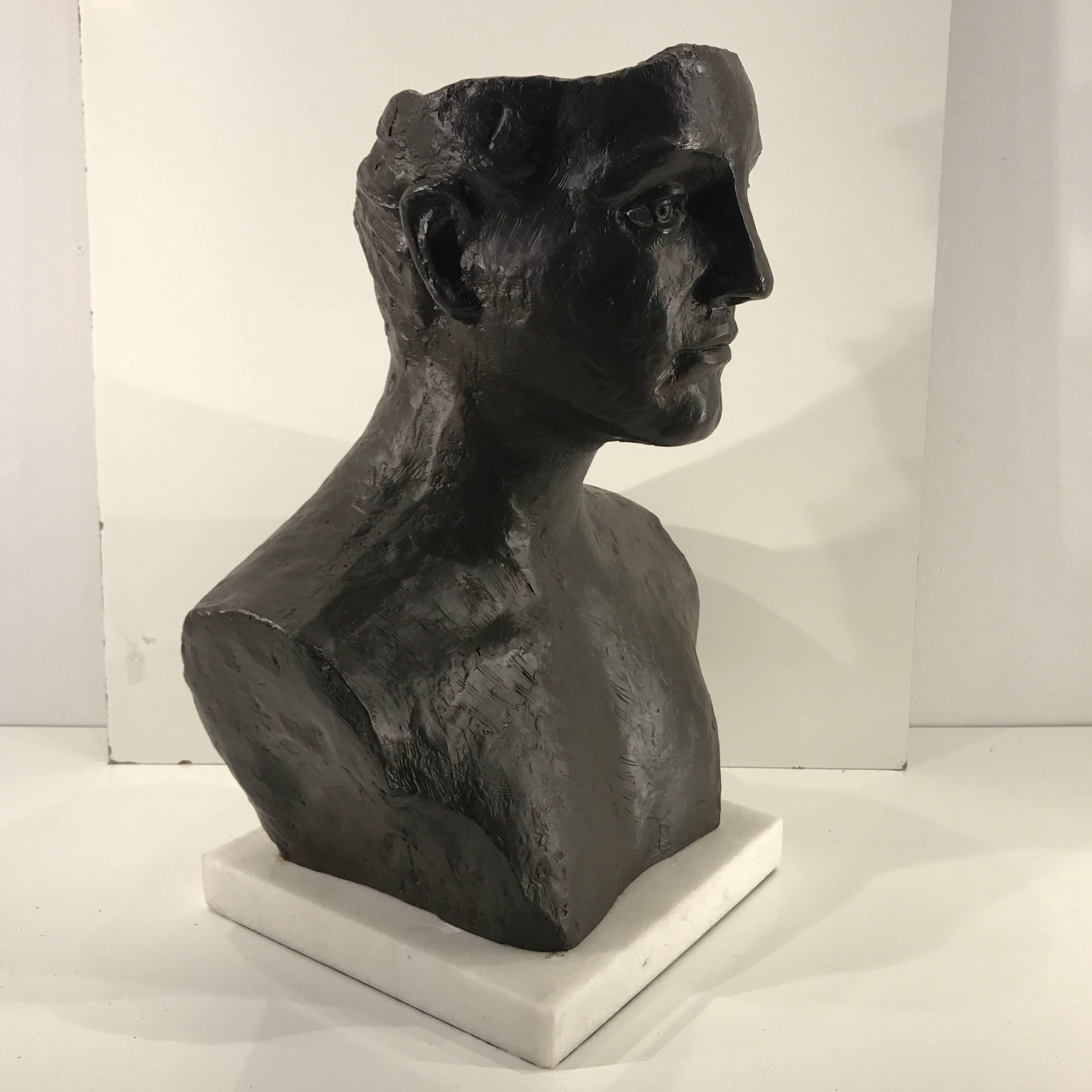 Modern bronze and marble bust of a man, A cross of Grand Tour and modern style, with an open mind, literally. The portrait bust with pierced eyes and open back of the head, hollow casting does not hold water. Unsigned.
The marble base has a 12"