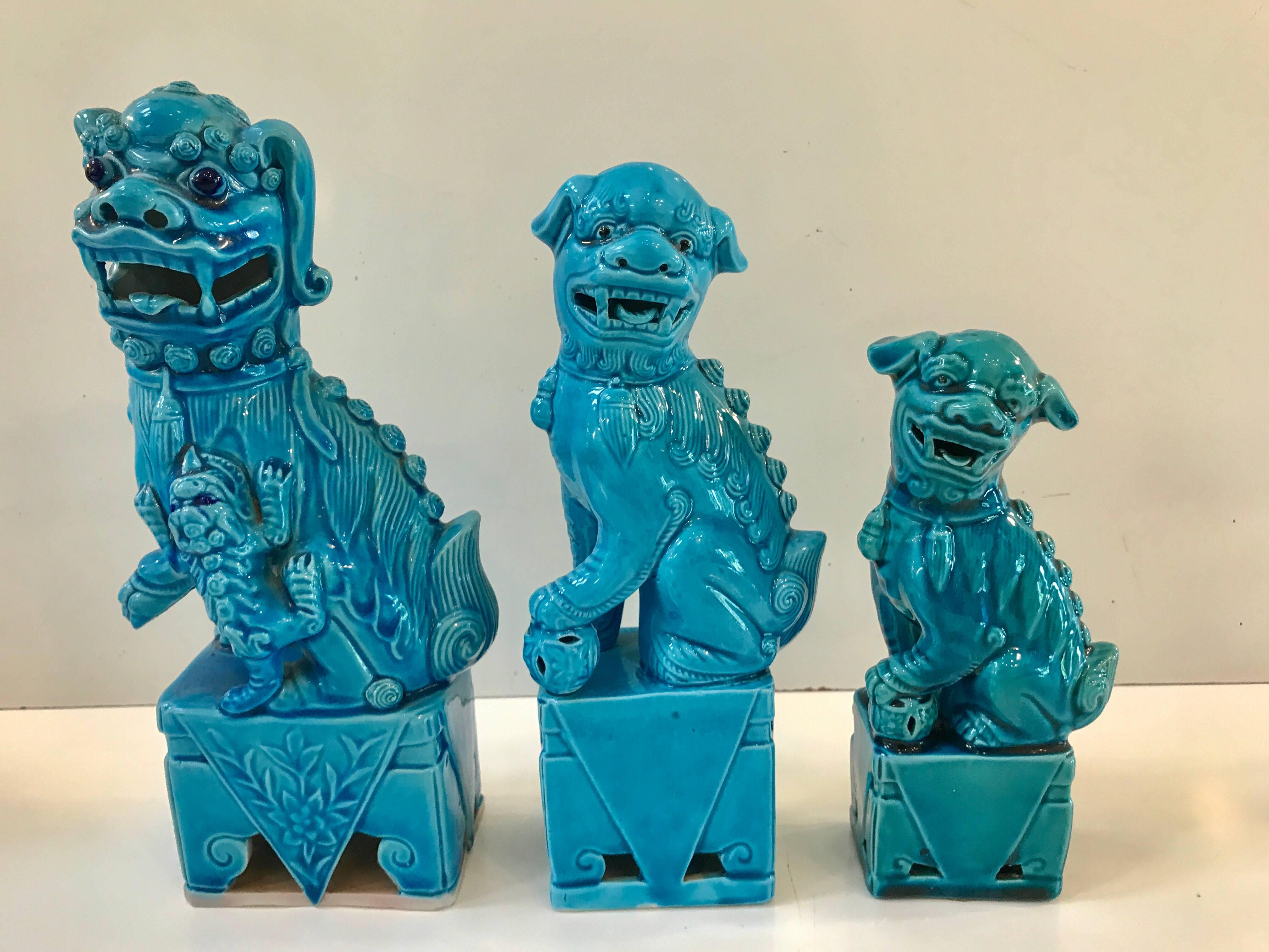 Porcelain Collection of 14 Graduating Turquoise Chinese Export Foo Dogs