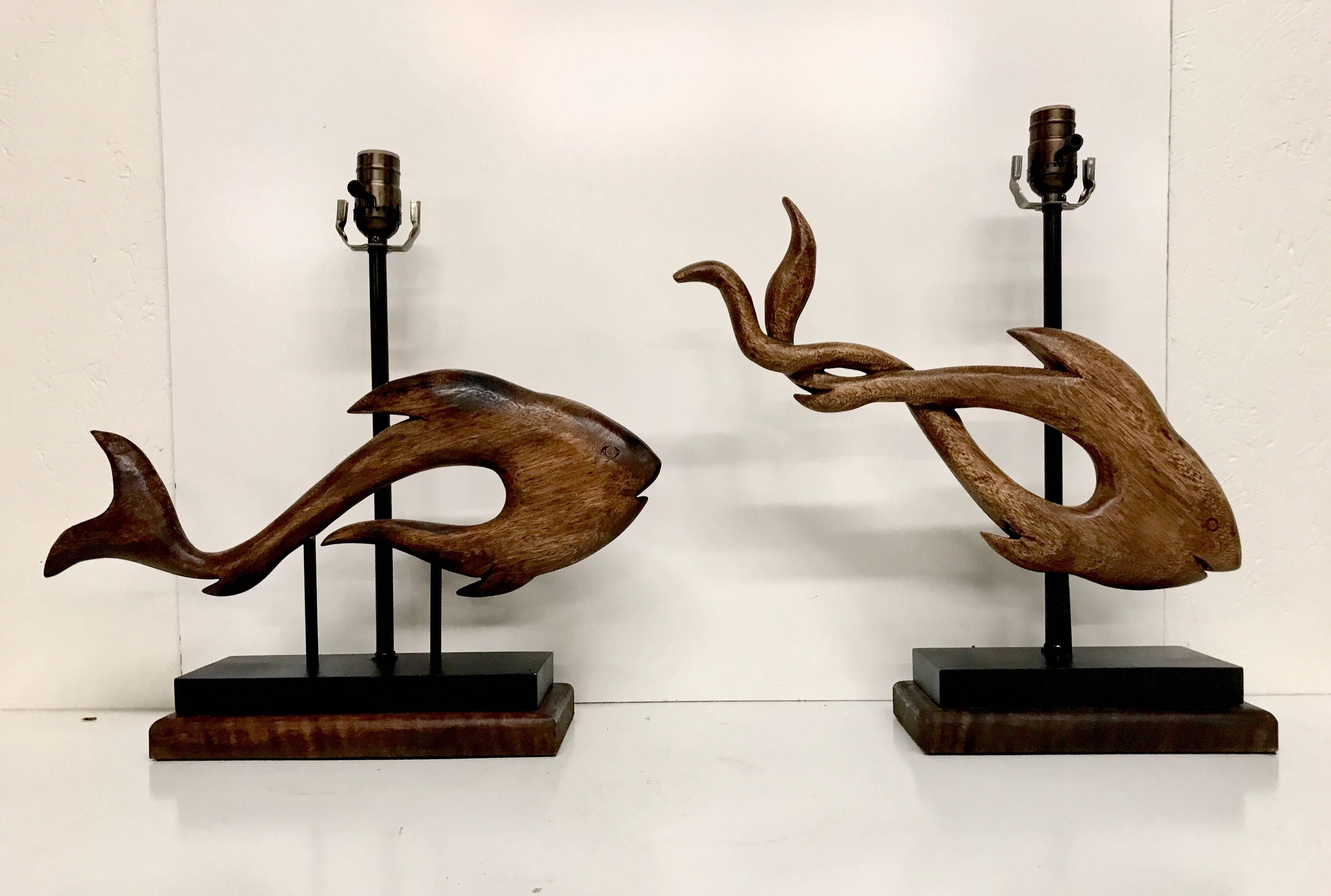 Pair of midcentury carved wood fish sculptures now as lamps. Newly wired.
Fish I
5