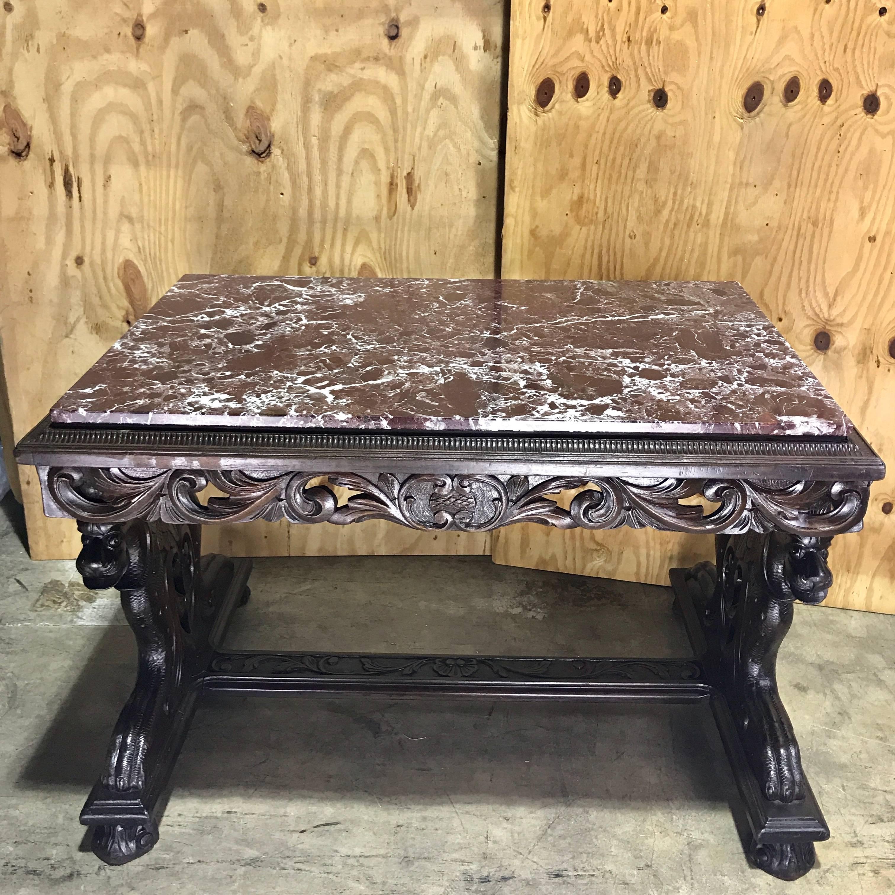 Italian figural carved walnut rouge marble-top table, breakers Palm Beach, acquired from the breakers in the 1970s, now available.