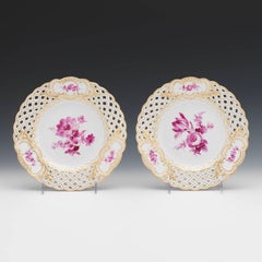 Eight Meissen Reticulated Painted Floral Motif Plates, in a Rose Palette