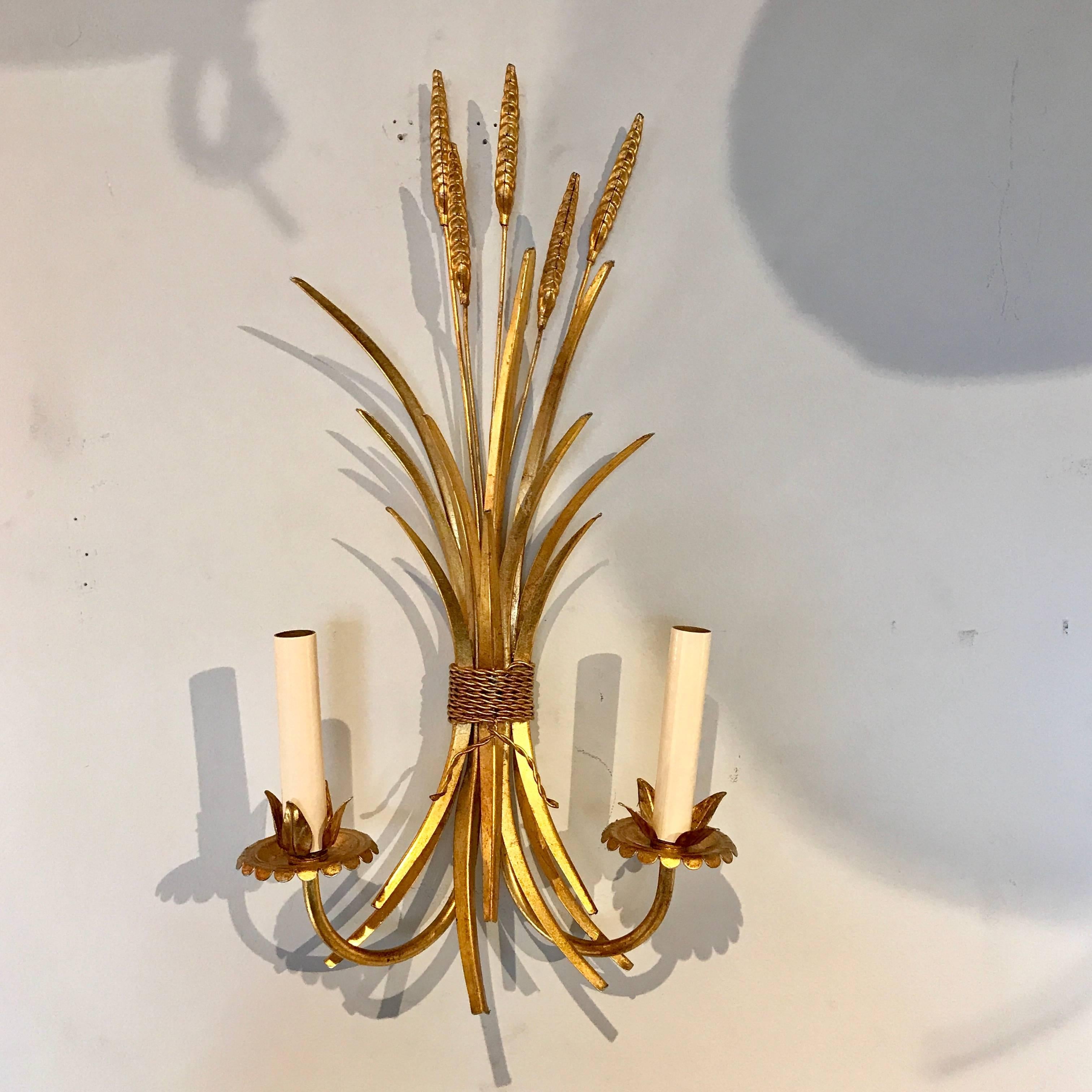 Pair of Italian midcentury gilt sheaf of wheat motif two-light sconces, newly wired.