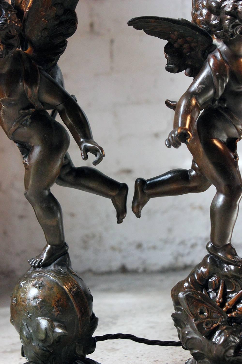 Early 20th Century Pair of French Spelter & Marble Table Lamps Modeled as Winged Cherubs circa 1915
