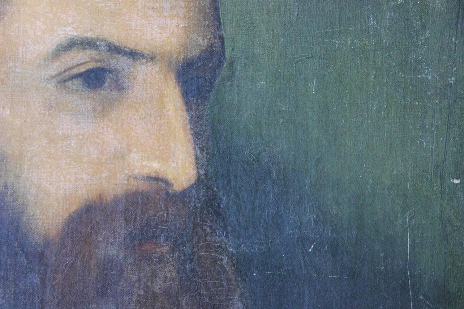 Painted within the circle of George Frederic Watts, in oils on canvas, the head and shoulders portrait of a bearded young gentleman, shown in profile, having a thick bushy beard and wearing a white undergarment to a black overcoat, the background a