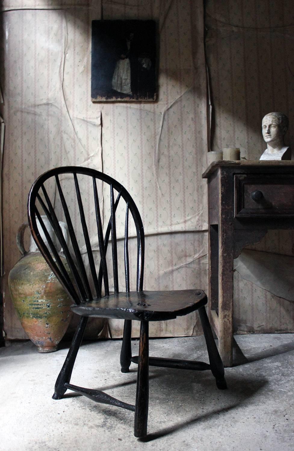 English West-Country Black Painted Braced Bow-Back Windsor Chair, circa 1800 1