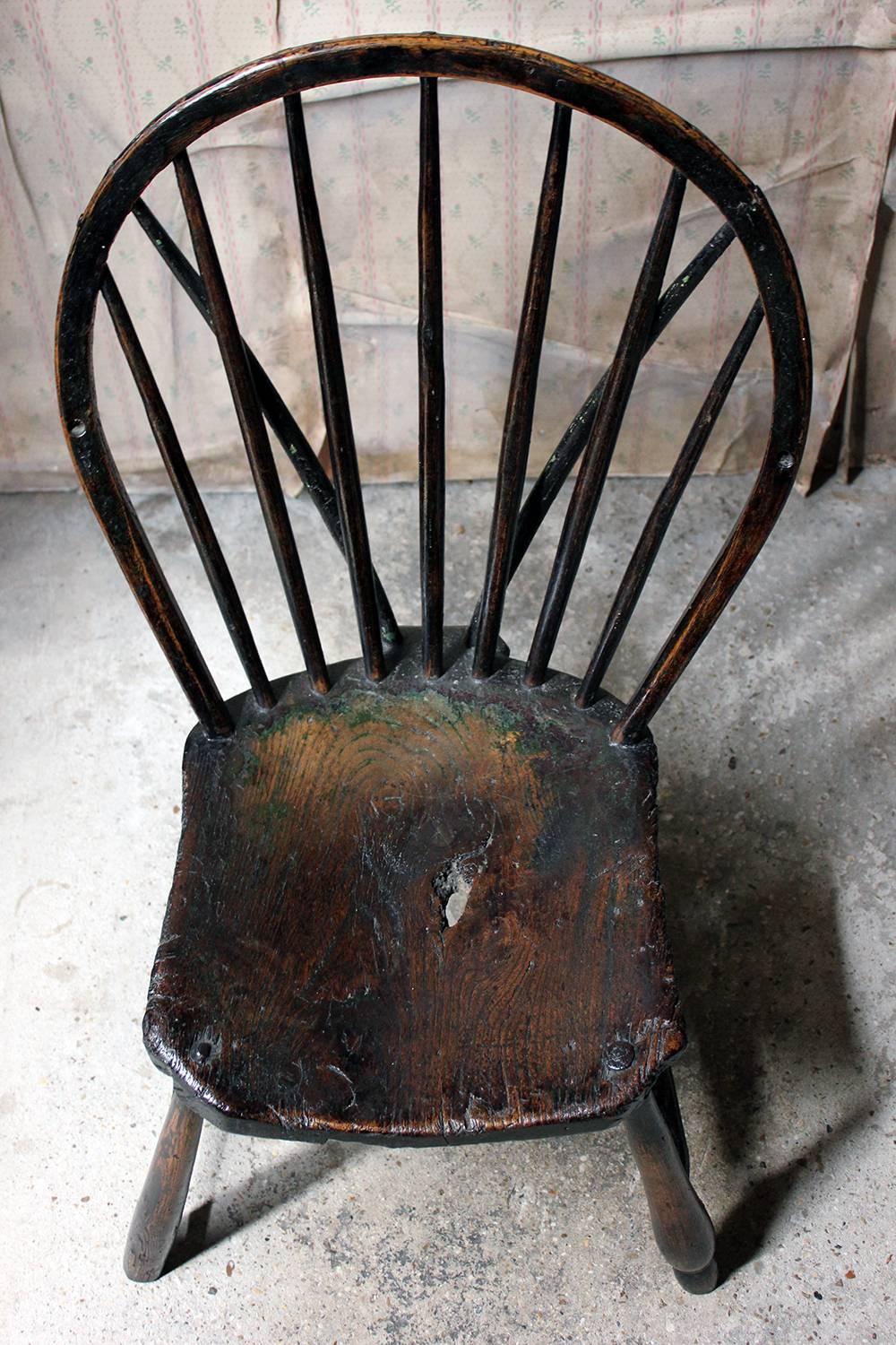 Early 19th Century English West-Country Black Painted Braced Bow-Back Windsor Chair, circa 1800