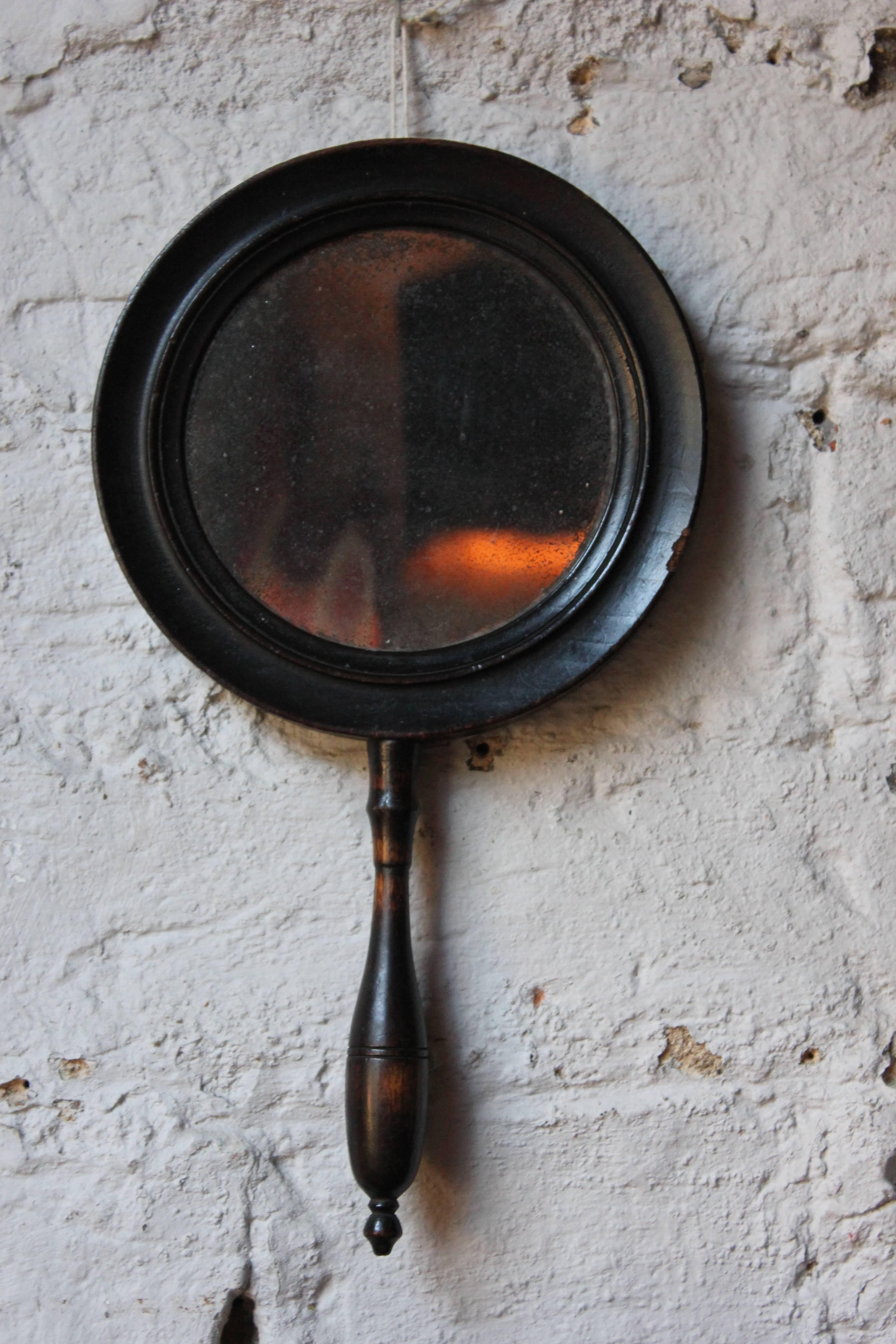 English Rare 18th century Ebonized Convex/Concave Hand Mirror, circa 1790