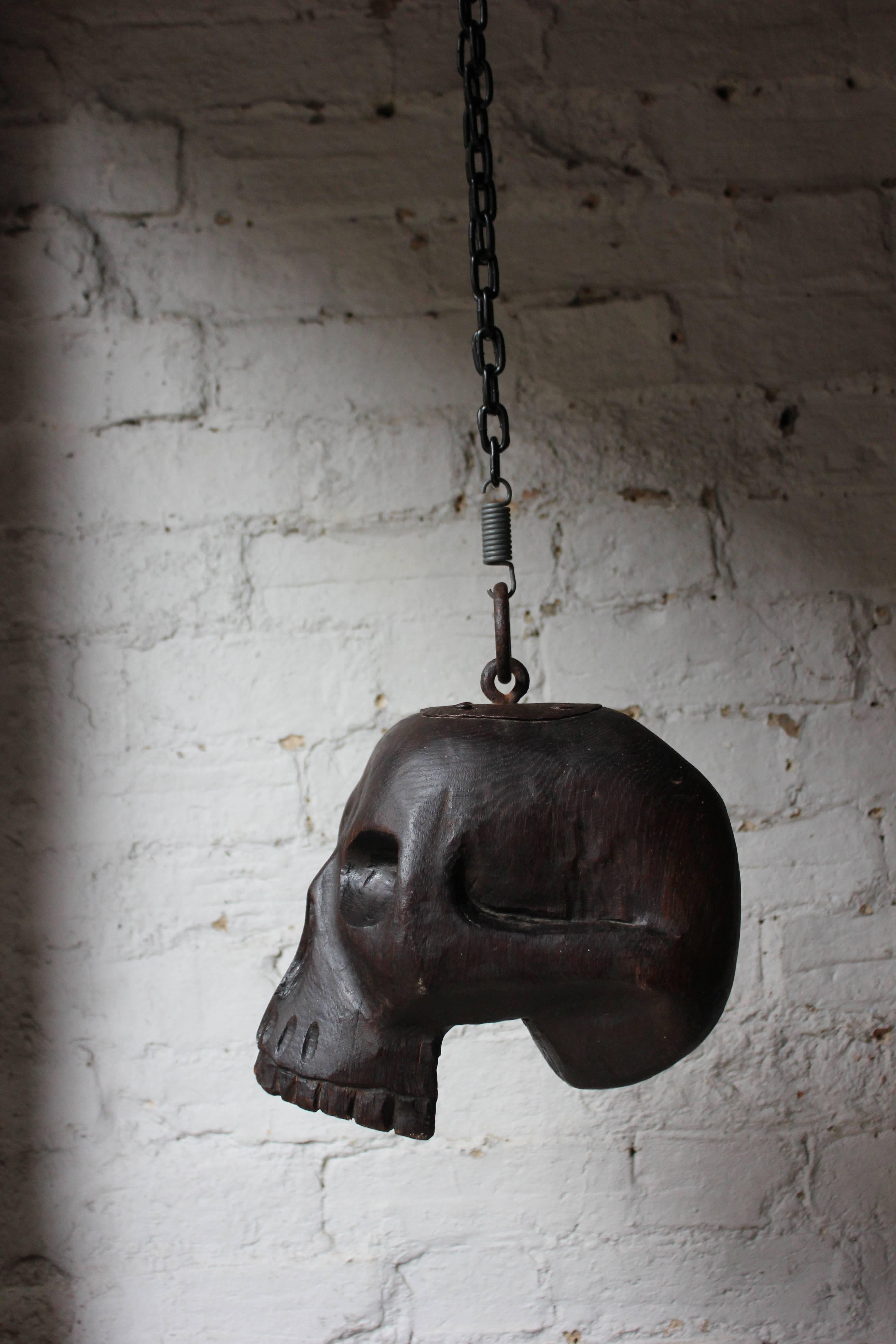 18th Century Oak and Iron Mounted Memento Mori Doorstop Carved as a Human Skull In Good Condition In Bedford, Bedfordshire